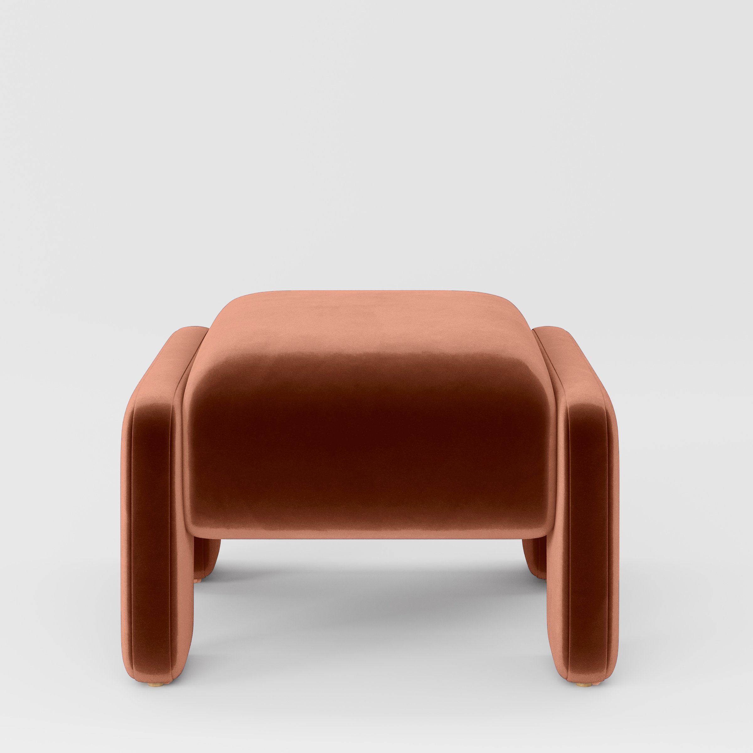 Front view of the Inny footstool upholstered in Plush EasyClean Velvet in Apricot.
