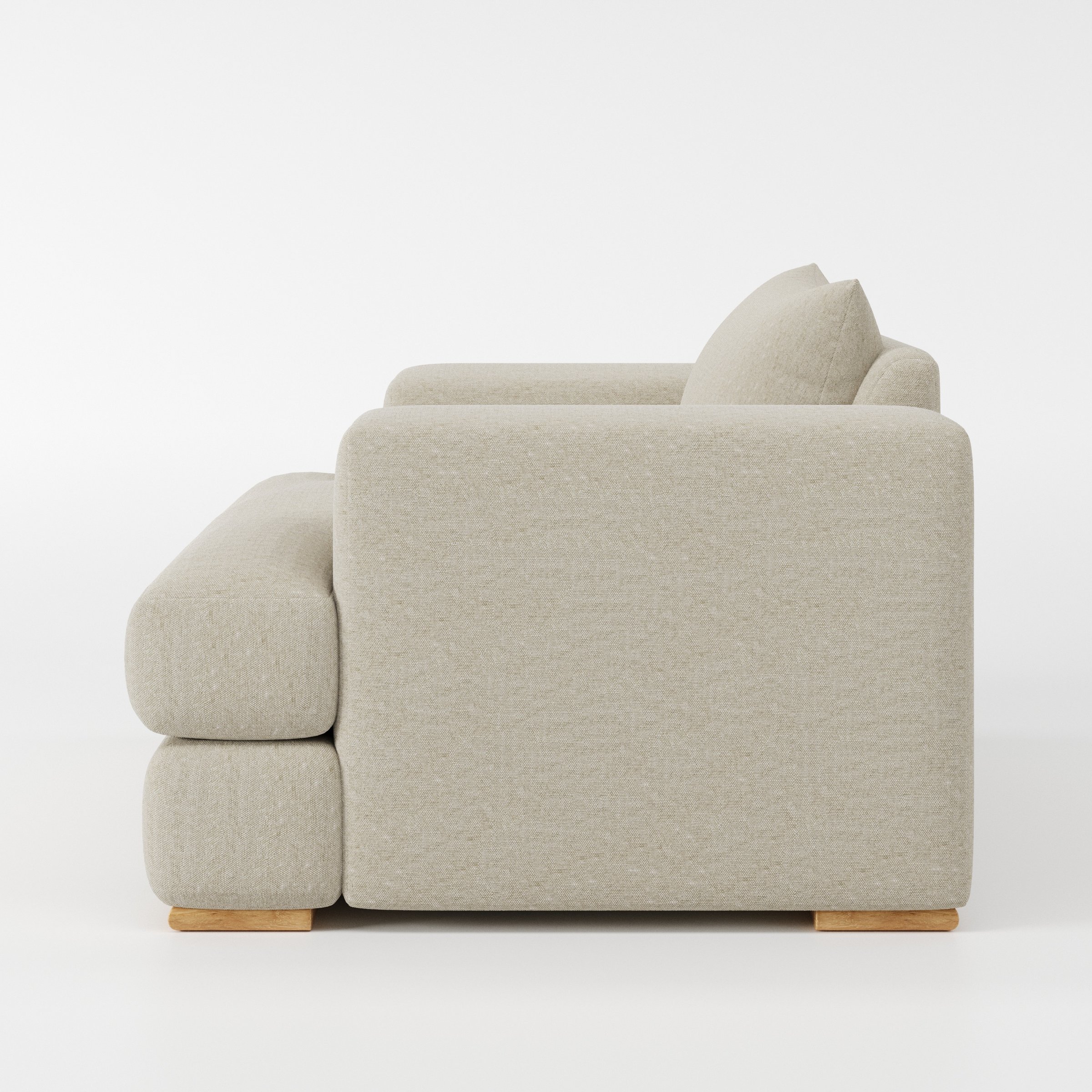 Fane armchair in Alderney Linen Oatmeal shown in side profile displaying proportions and overall silhouette.