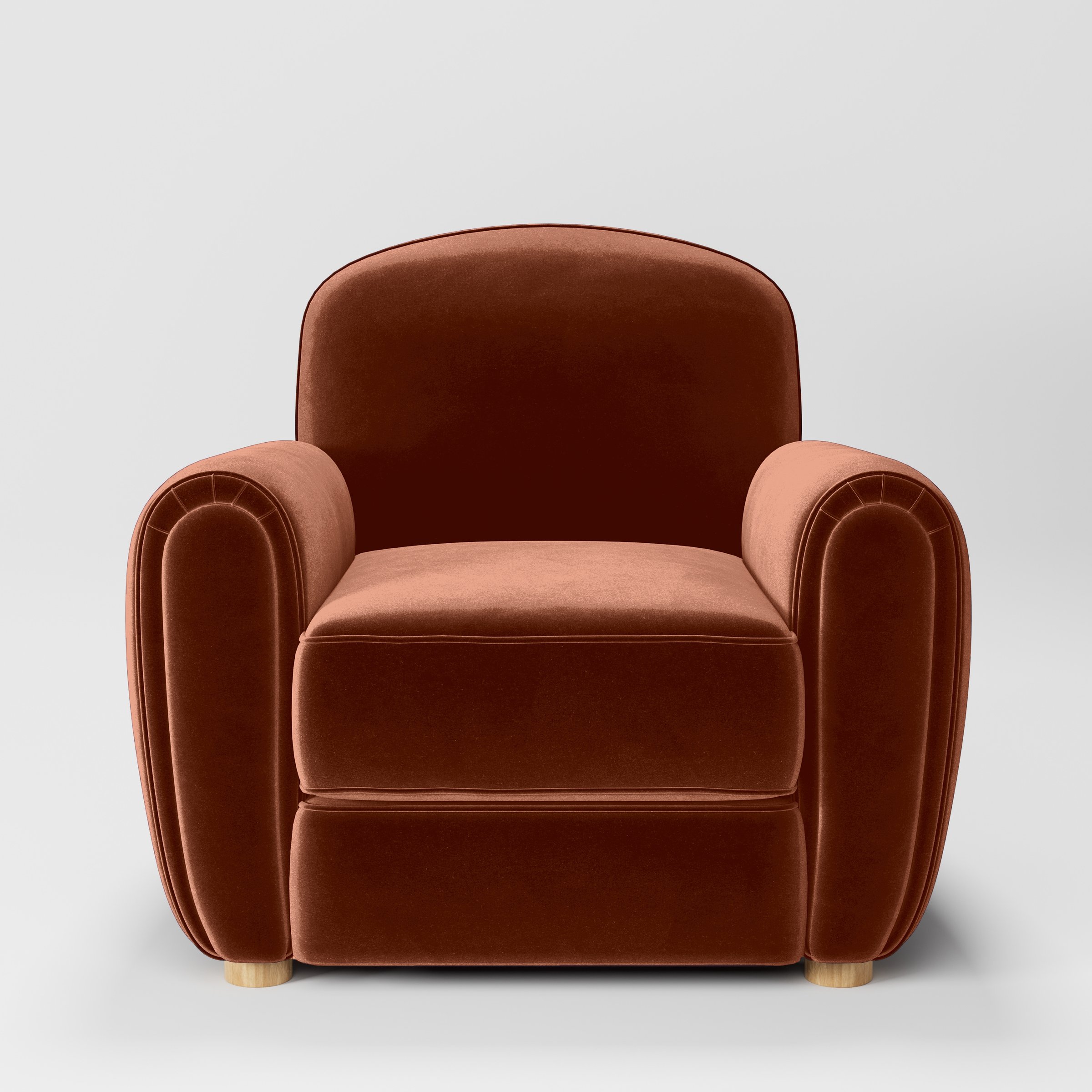 Front view of the Fergus armchair upholstered in Plush EasyClean Velvet in Apricot.