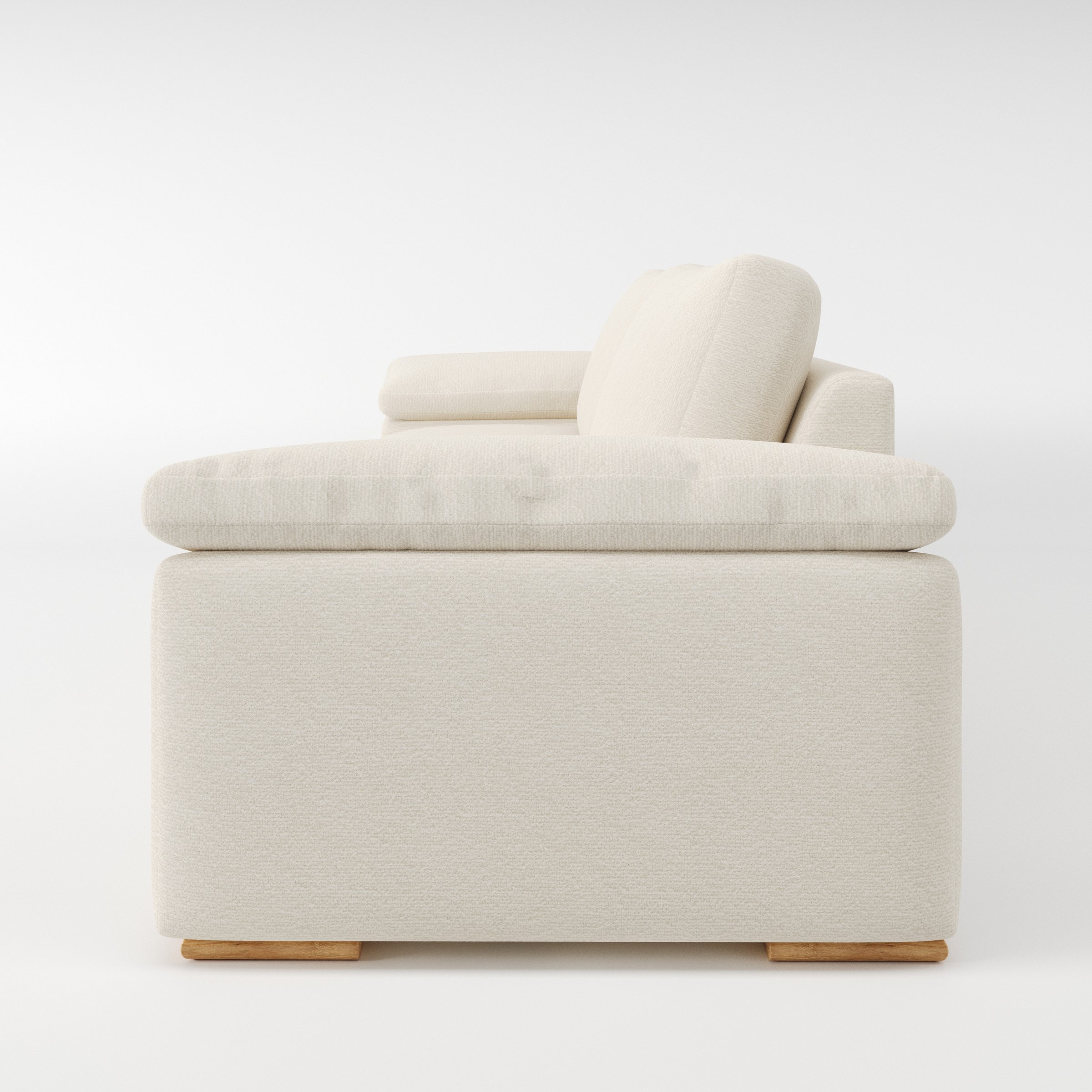 Moy sofa in Kilda Boucle Cream shown in side profile displaying proportions and overall silhouette.