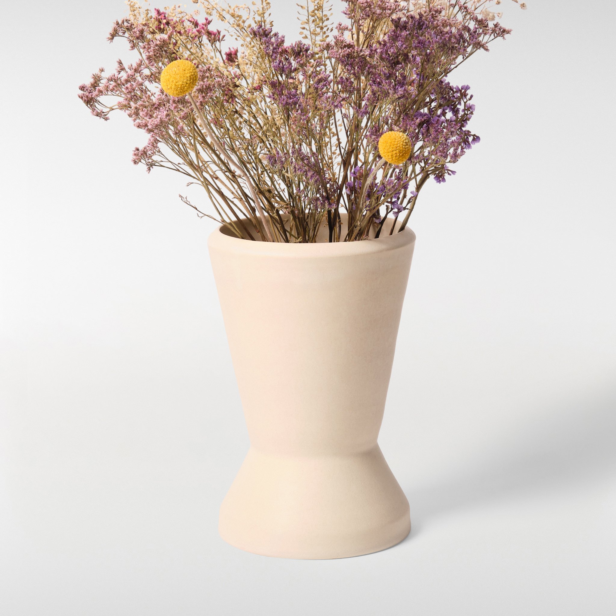 Chamfer Vase 2 in matte cream finish with dried flowers, tapered ceramic vase with minimal sculpted base