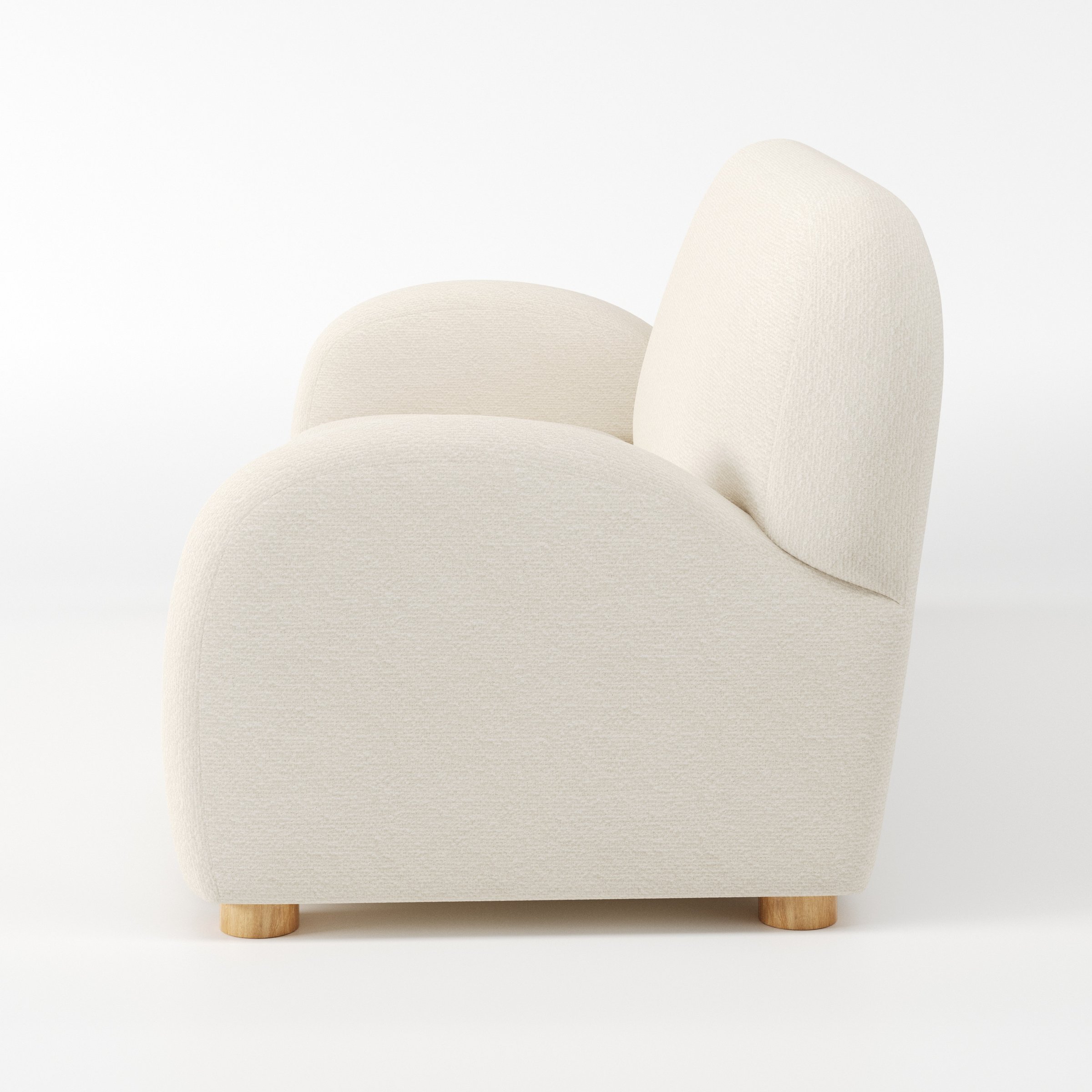 Awe sofa in Kilda Boucle Cream shown in side profile displaying proportions and overall silhouette.