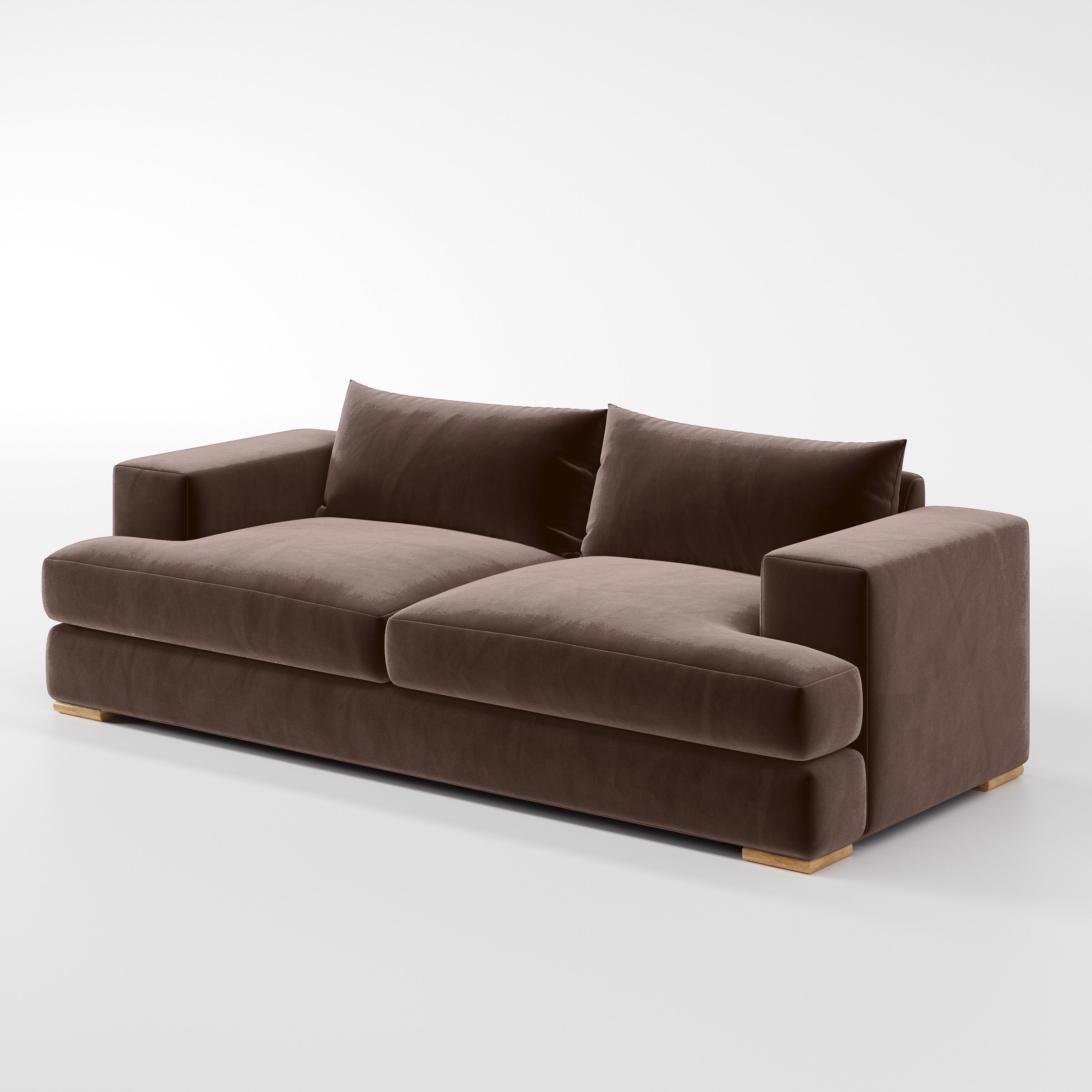 Diagonal view of the Fane sofa upholstered in Plush EasyClean Velvet in Mole.