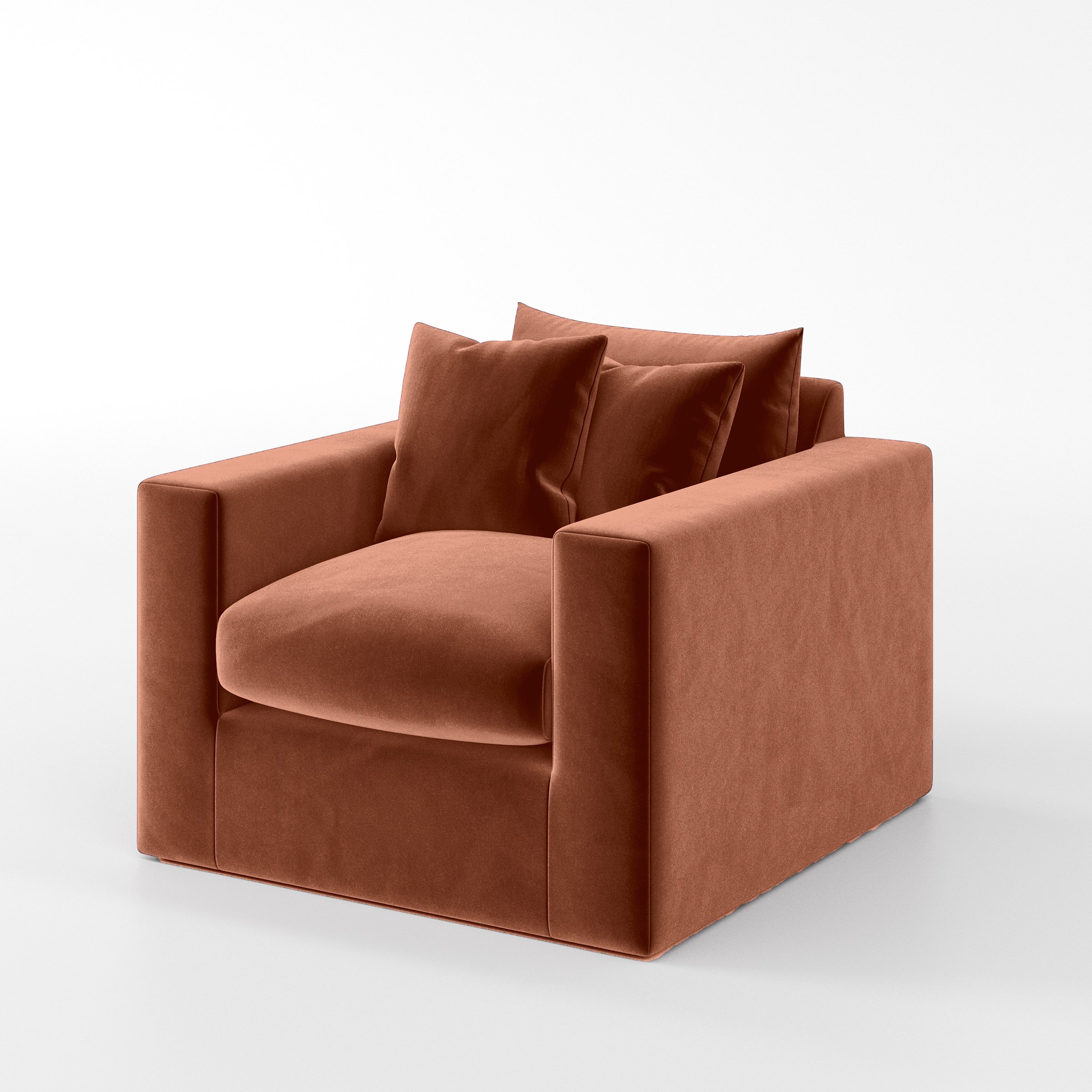 Diagonal view of the Coniston armchair upholstered in Plush EasyClean Velvet in Apricot.