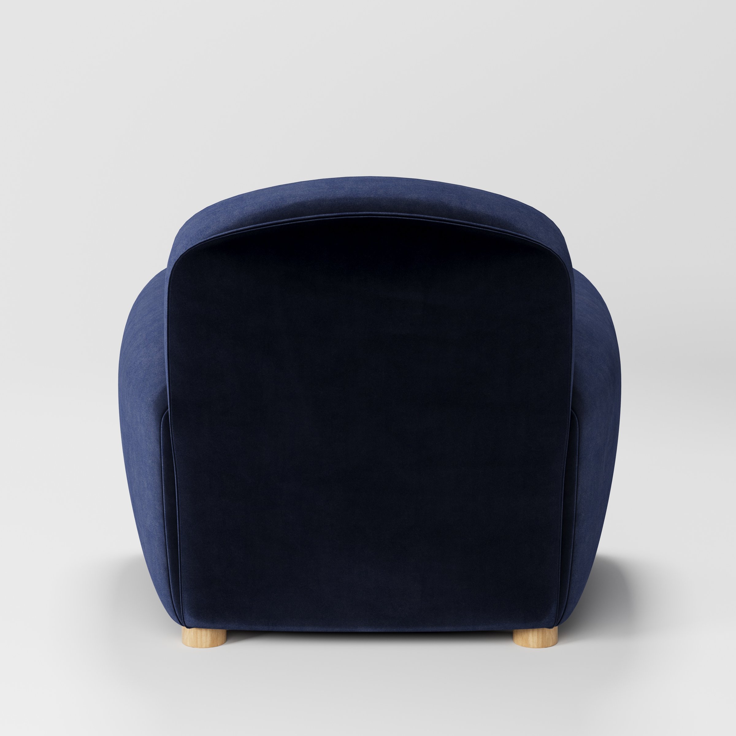 Fergus armchair in Noss Velvet Navy shown from the rear highlighting backrest shape and upholstery finish.