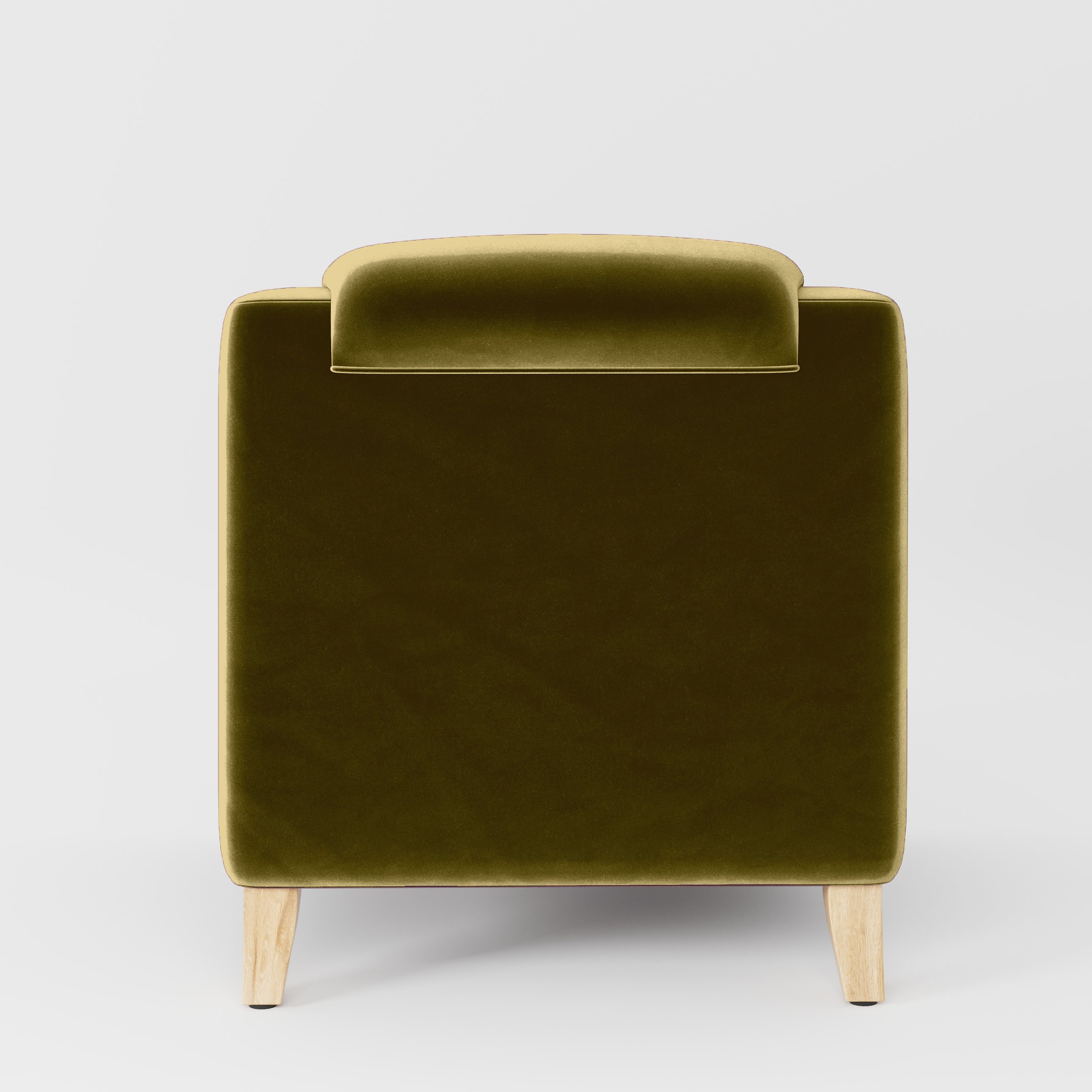 Rear view of the Erne armchair upholstered in Plush EasyClean Velvet in Celery.