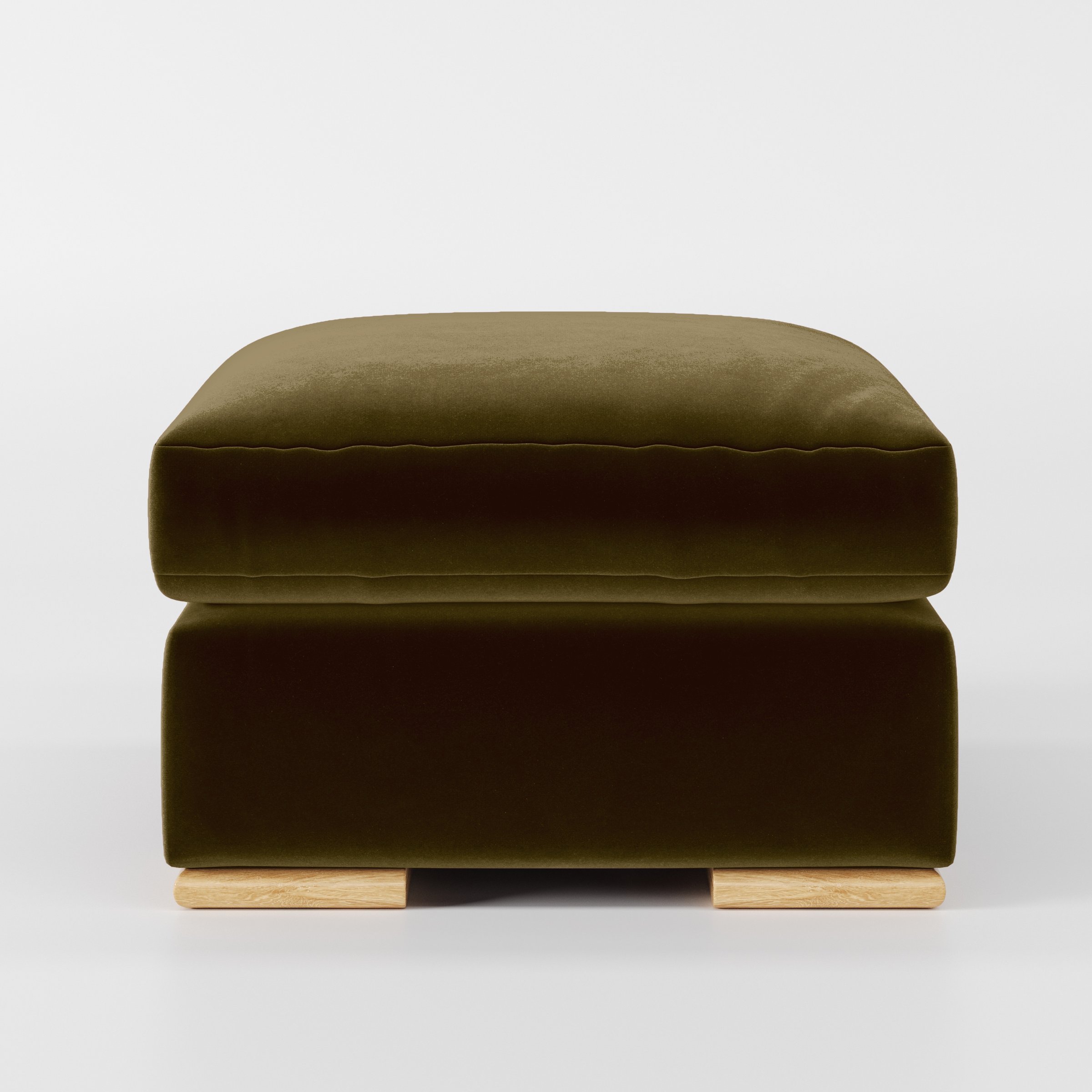 Front view of the Fane footstool upholstered in Plush EasyClean Velvet in Cedar.