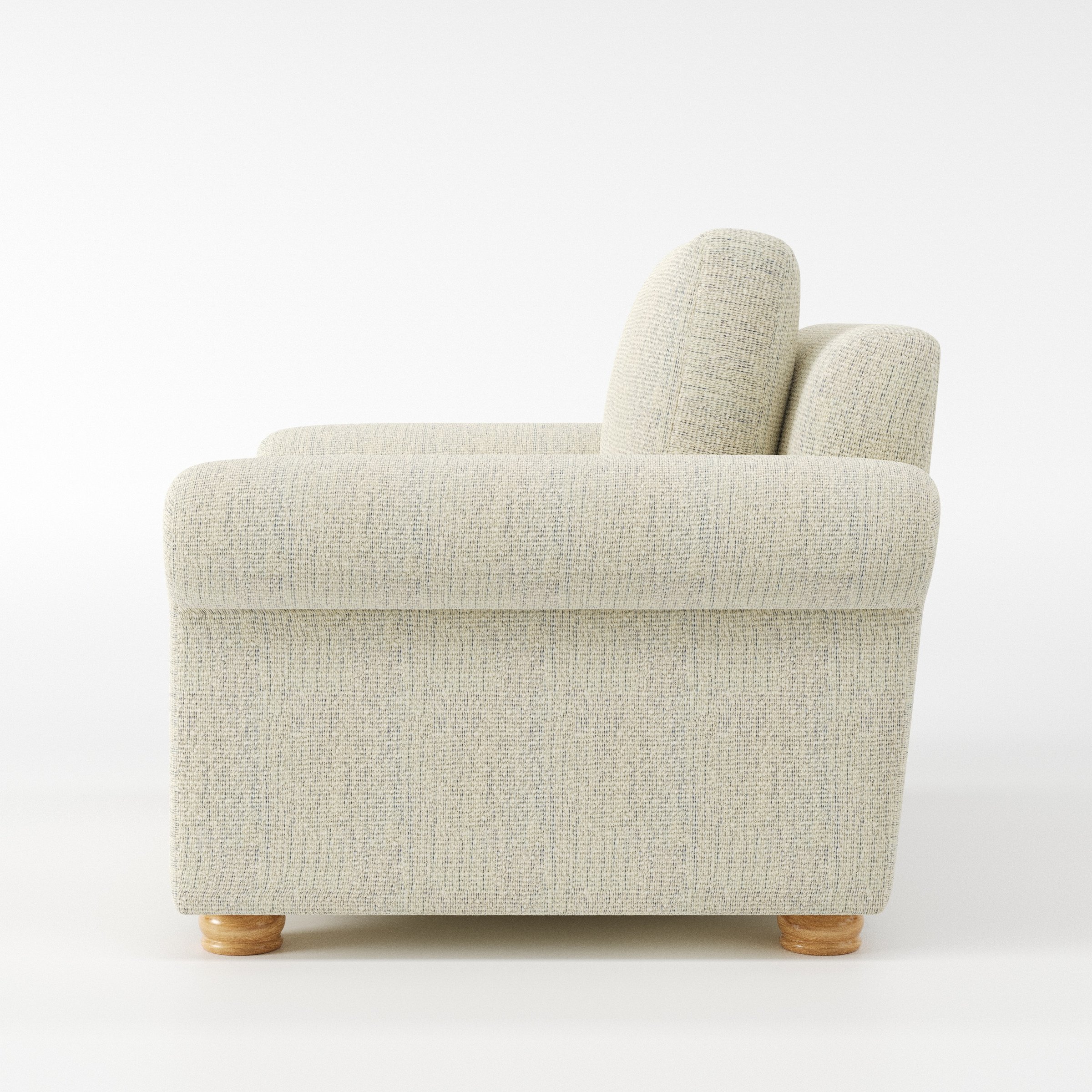 Anna Lee armchair in Orsay Boucle Cream and Marine shown in side profile displaying proportions and overall silhouette.