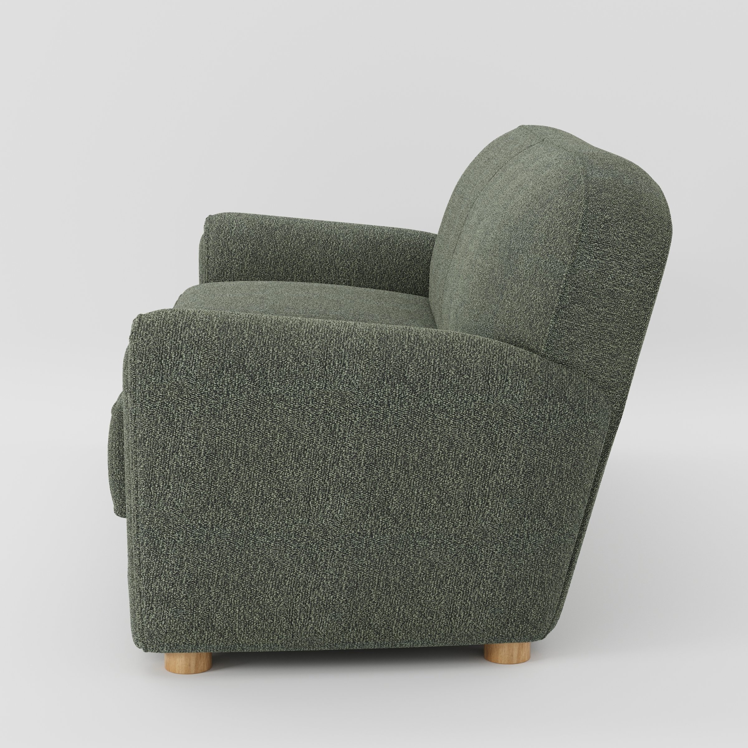 Fergus sofa in Kilda Boucle Moss shown in side profile displaying proportions and overall silhouette.