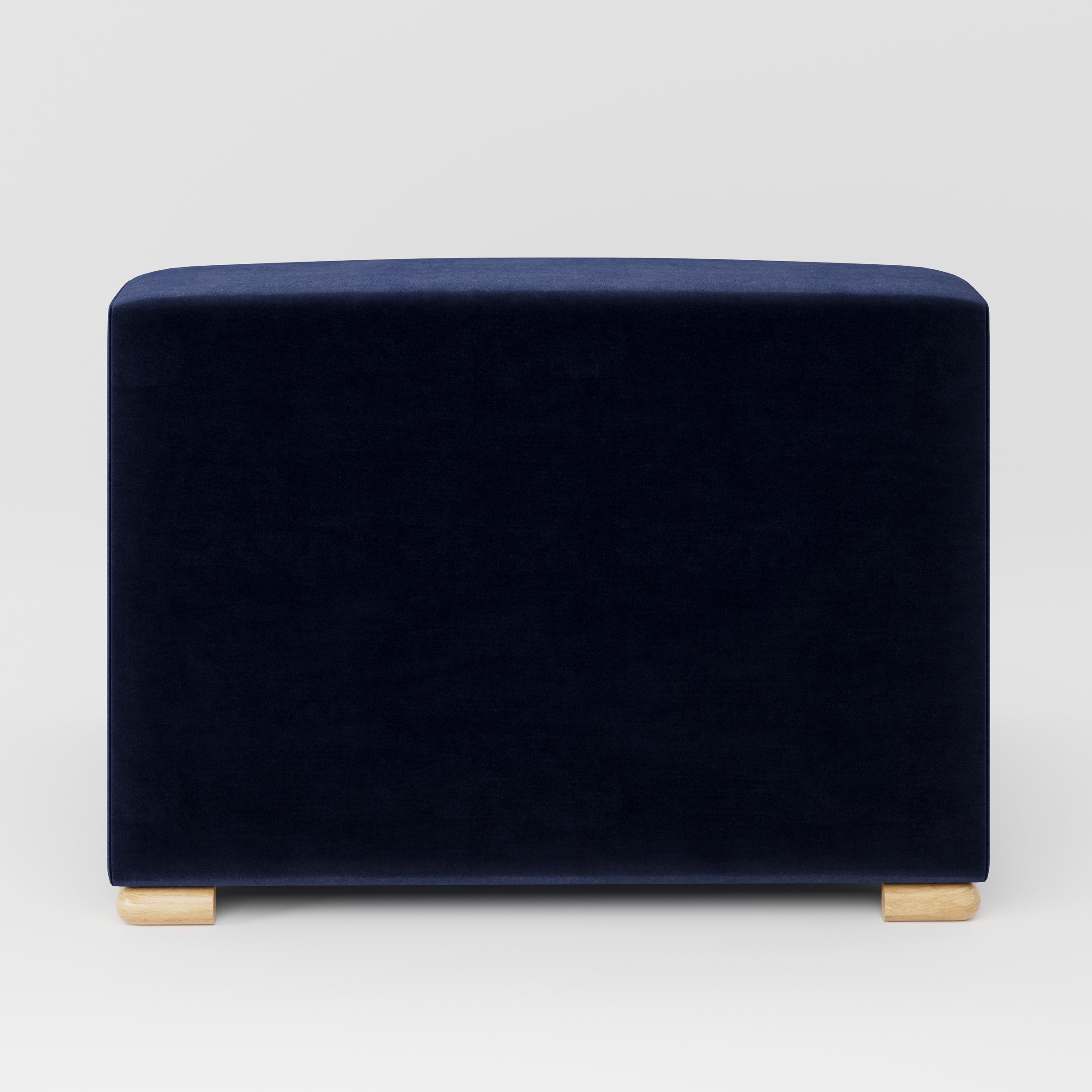Tay single sofa unit in Noss Velvet Navy shown from the back with a clean, softly curved silhouette and timber feet.