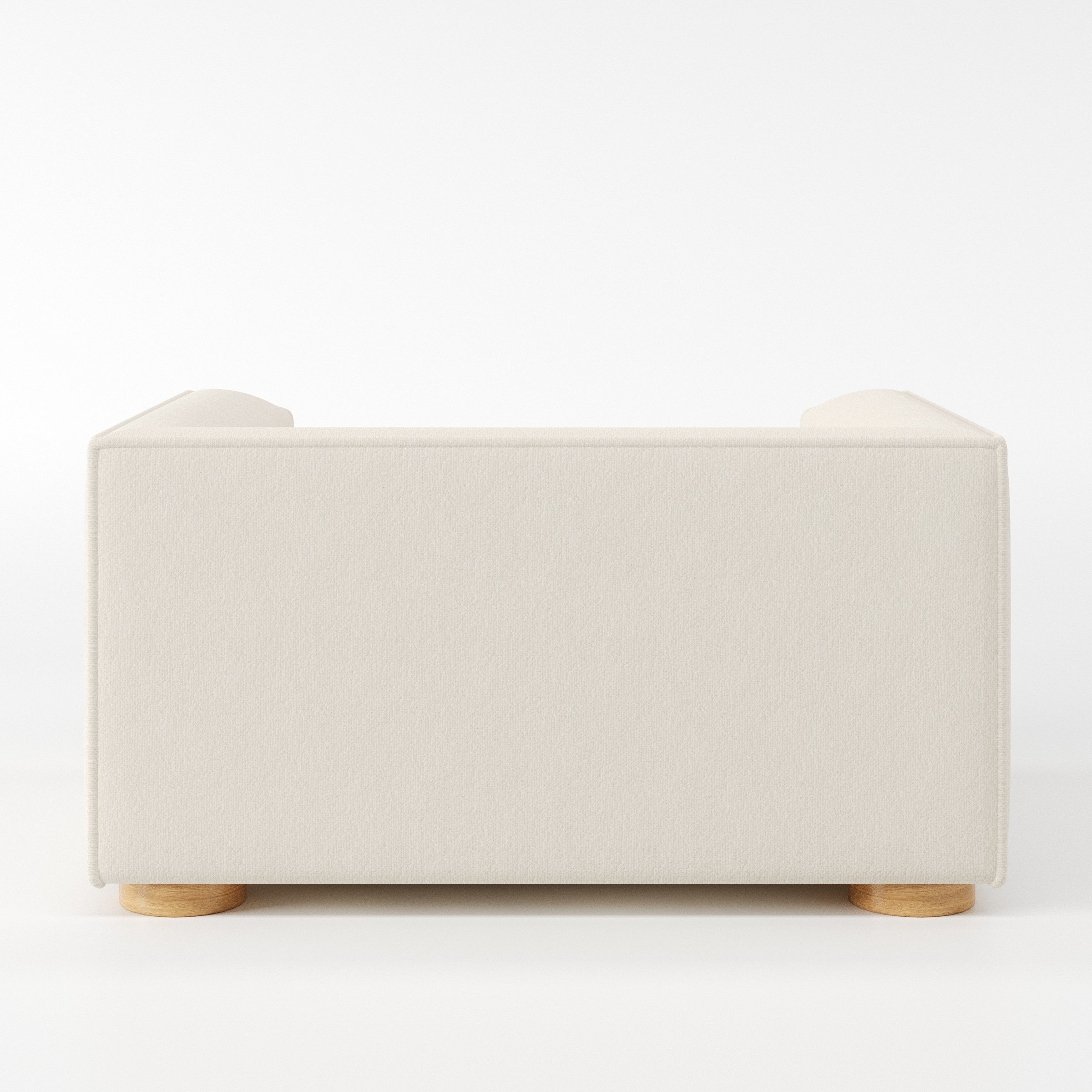 Feale armchair in Kilda Boucle Cream shown from the rear highlighting backrest shape and upholstery finish.