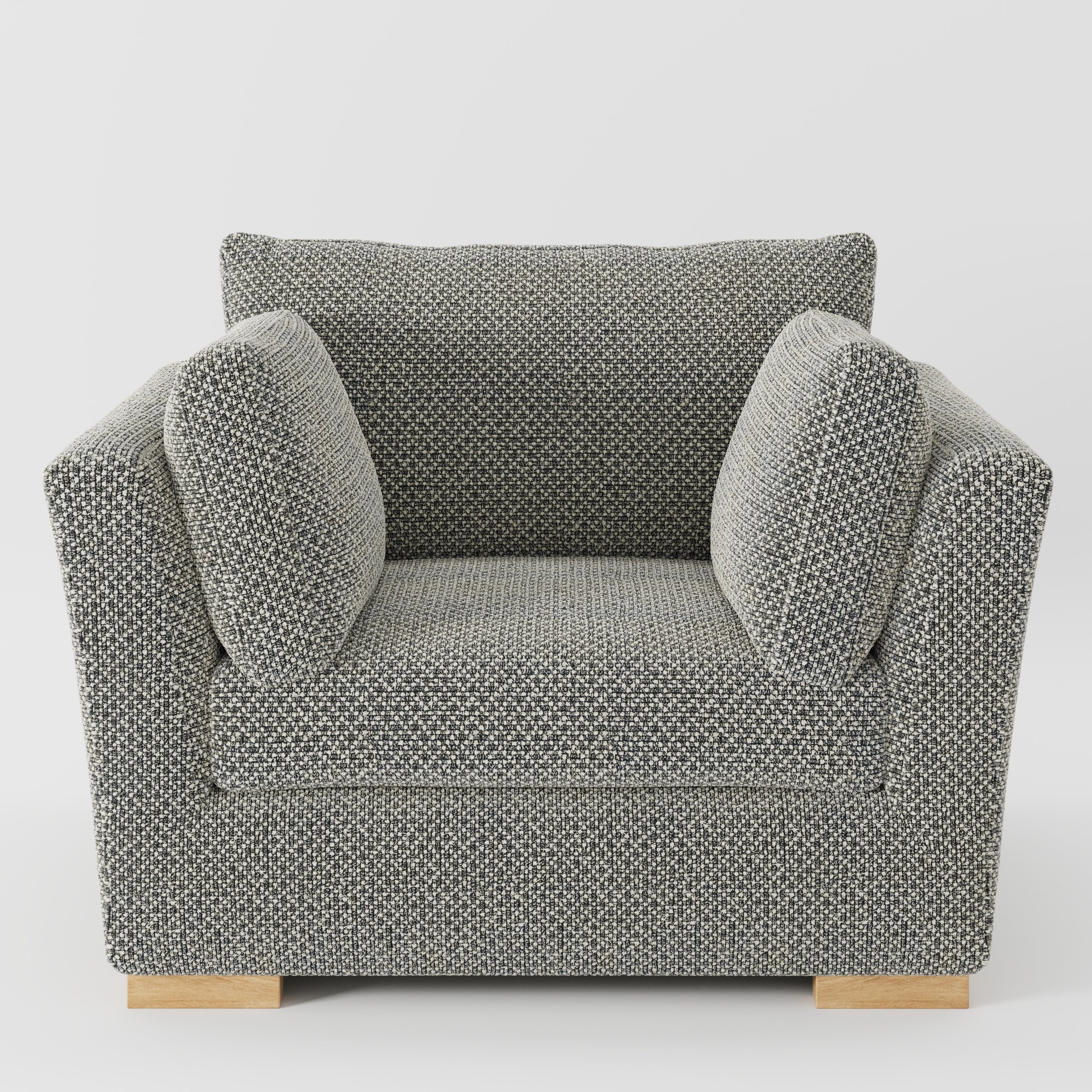 Stowe armchair in Rousay Wool Blend Tar and Chalk shown front-on against a neutral studio backdrop.