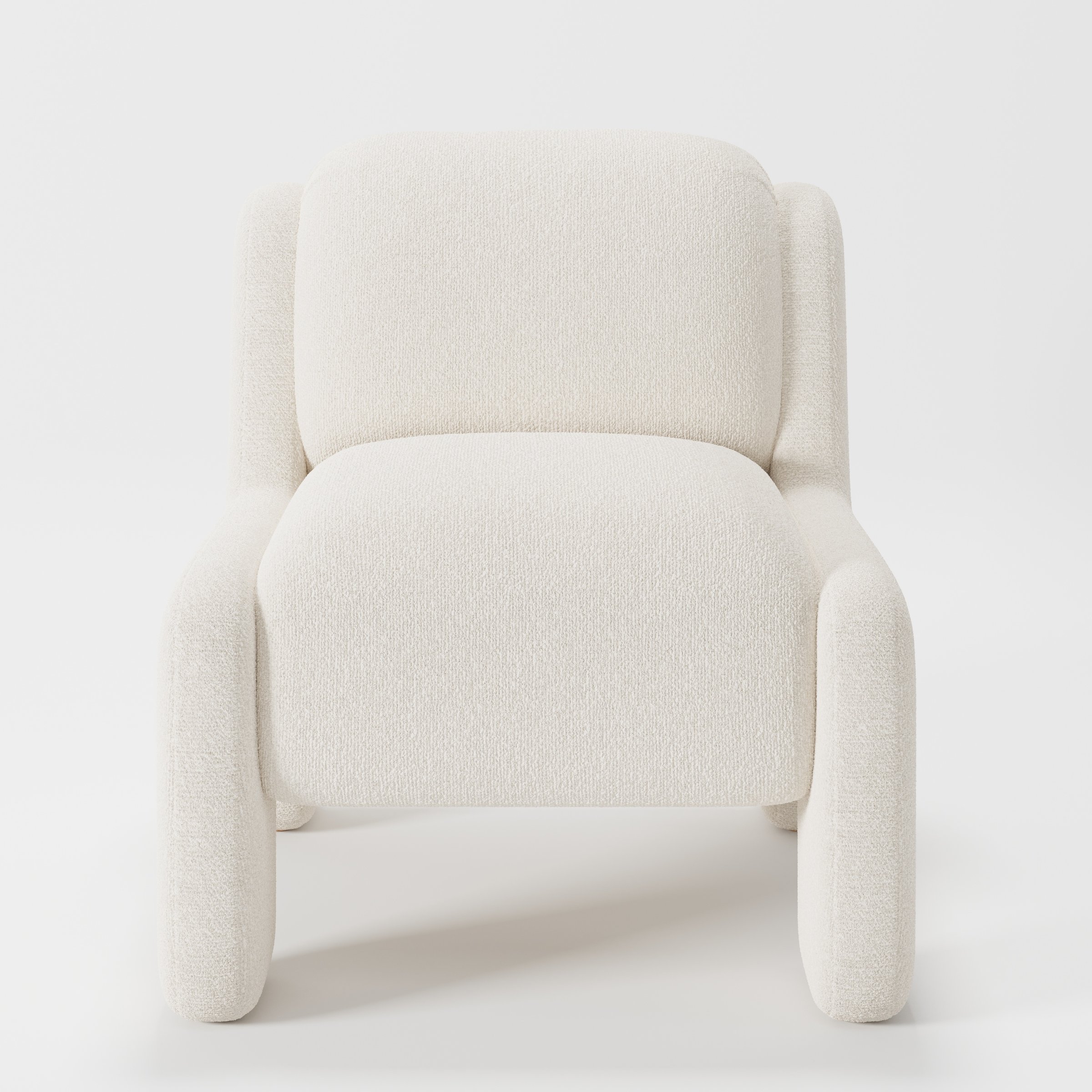 Inny armchair in Kilda Boucle Cream shown front-on against a neutral studio backdrop.