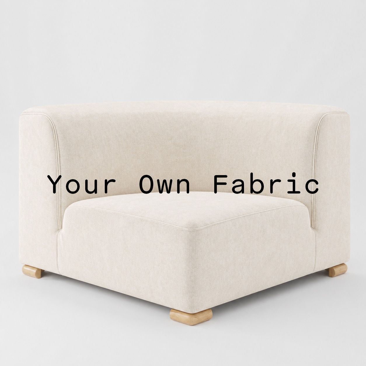 Diagonal view of the Tay corner unit upholstered in customers own material calico cotton fabric.