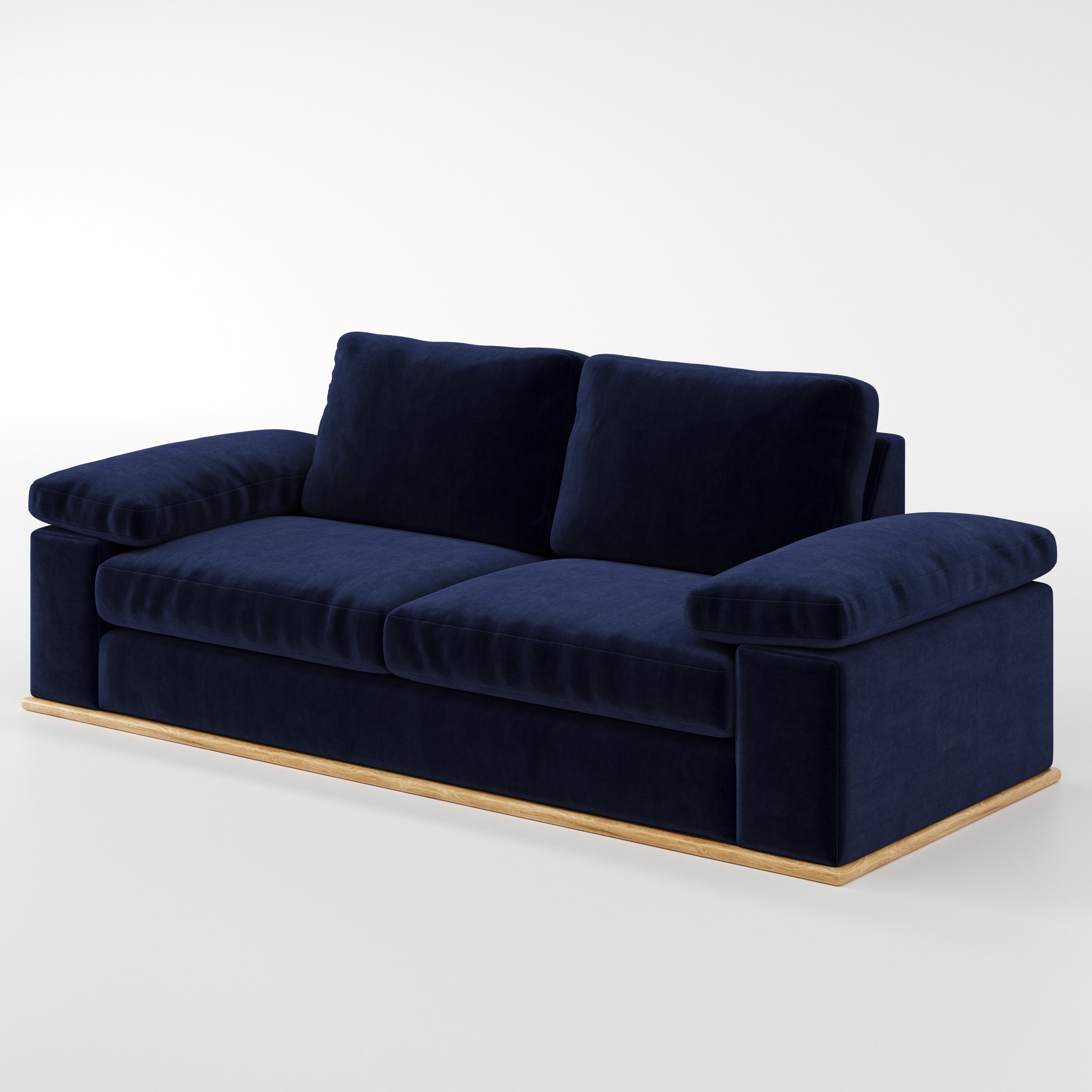 Cusher sofa in Noss Velvet Navy shown at a diagonal angle highlighting arm profile and seat depth.
