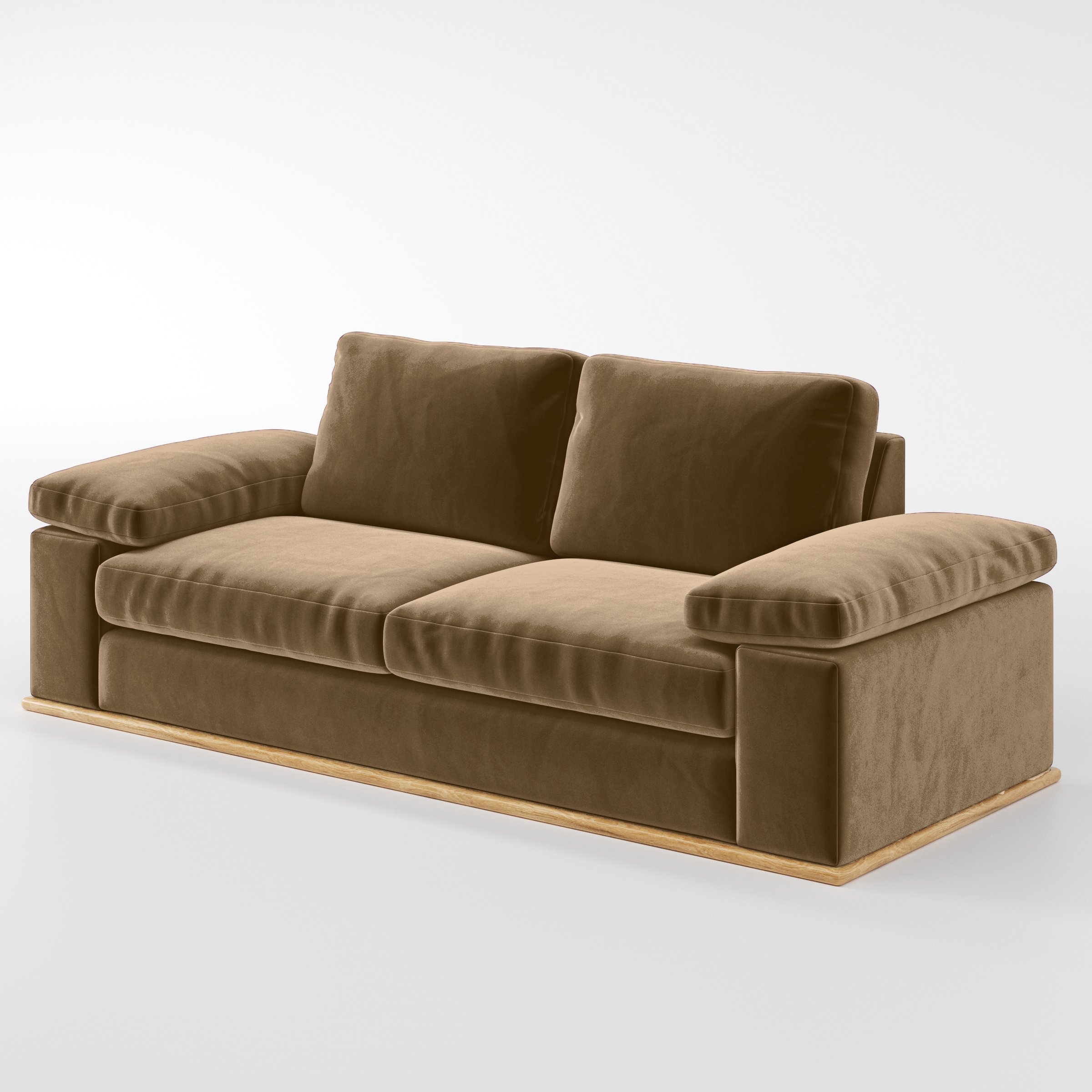 Diagonal view of the Cusher sofa upholstered in Plush EasyClean Velvet in Caribou.
