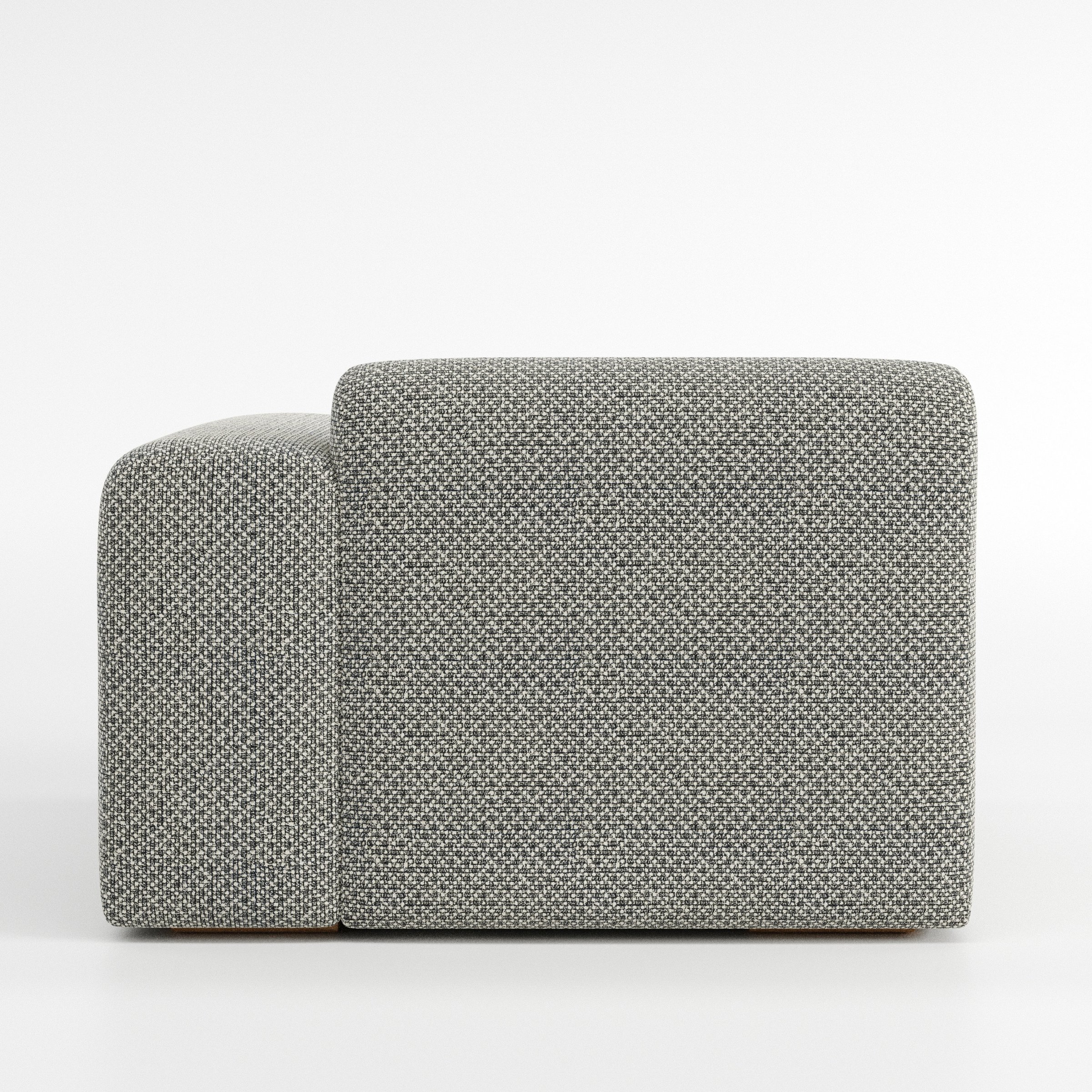 Drumquin modular sofa right side unit in Rousay Wool Blend Tar and Chalk shown from the back with a smooth, softly curved silhouette and armrest edge visible.
