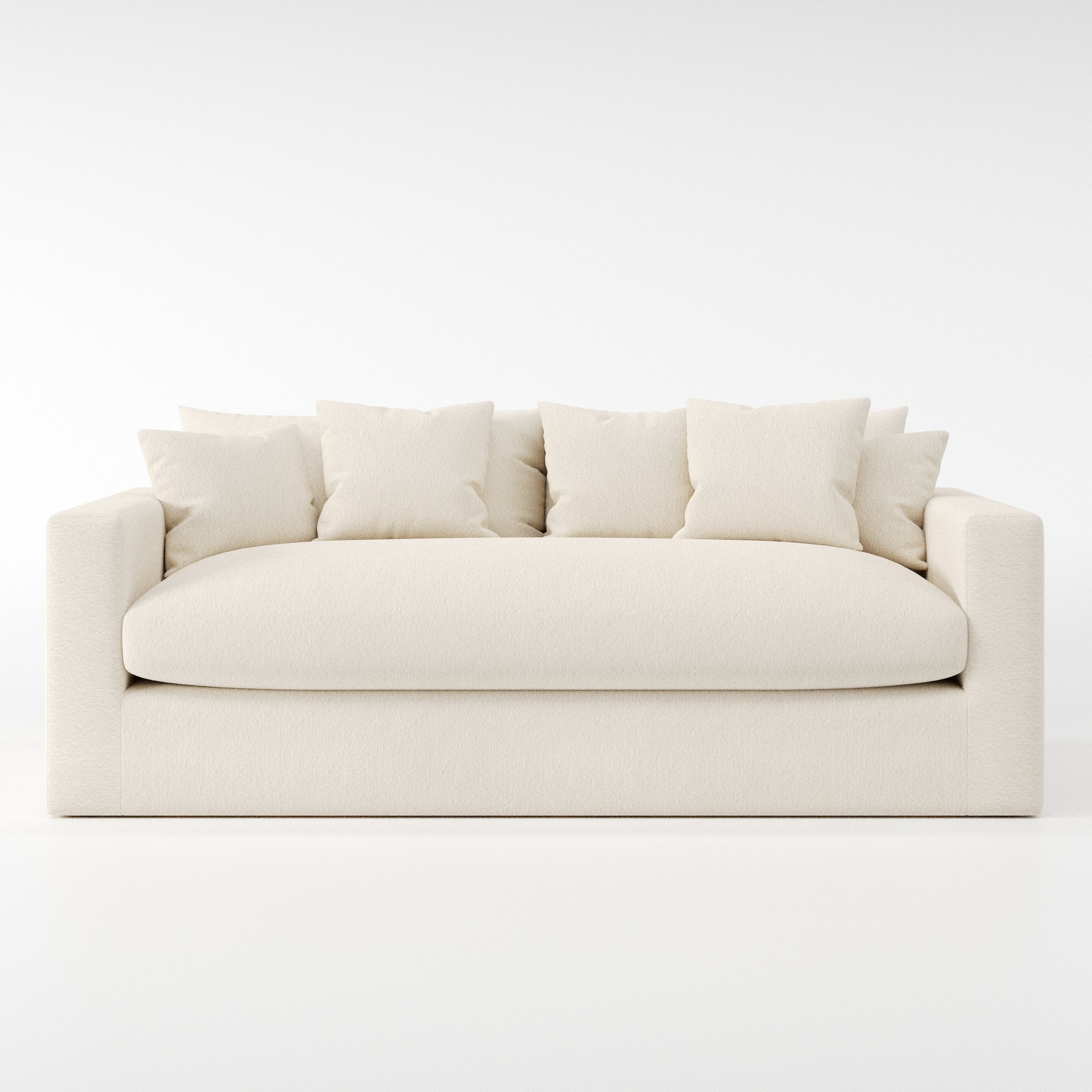 Coniston sofa in Kilda Boucle Cream shown front-on against a neutral studio backdrop.