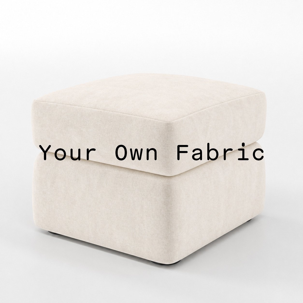Diagonal view of the Coniston footstool upholstered in customers own material calico cotton fabric.