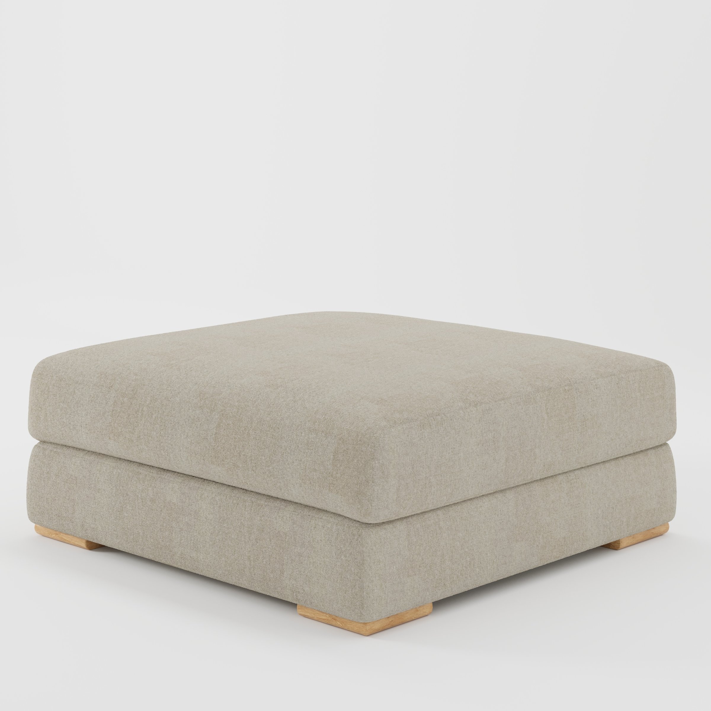 Darwell footstool in Alderney Linen Oatmeal shown at a diagonal angle highlighting broad proportions and low wooden base.