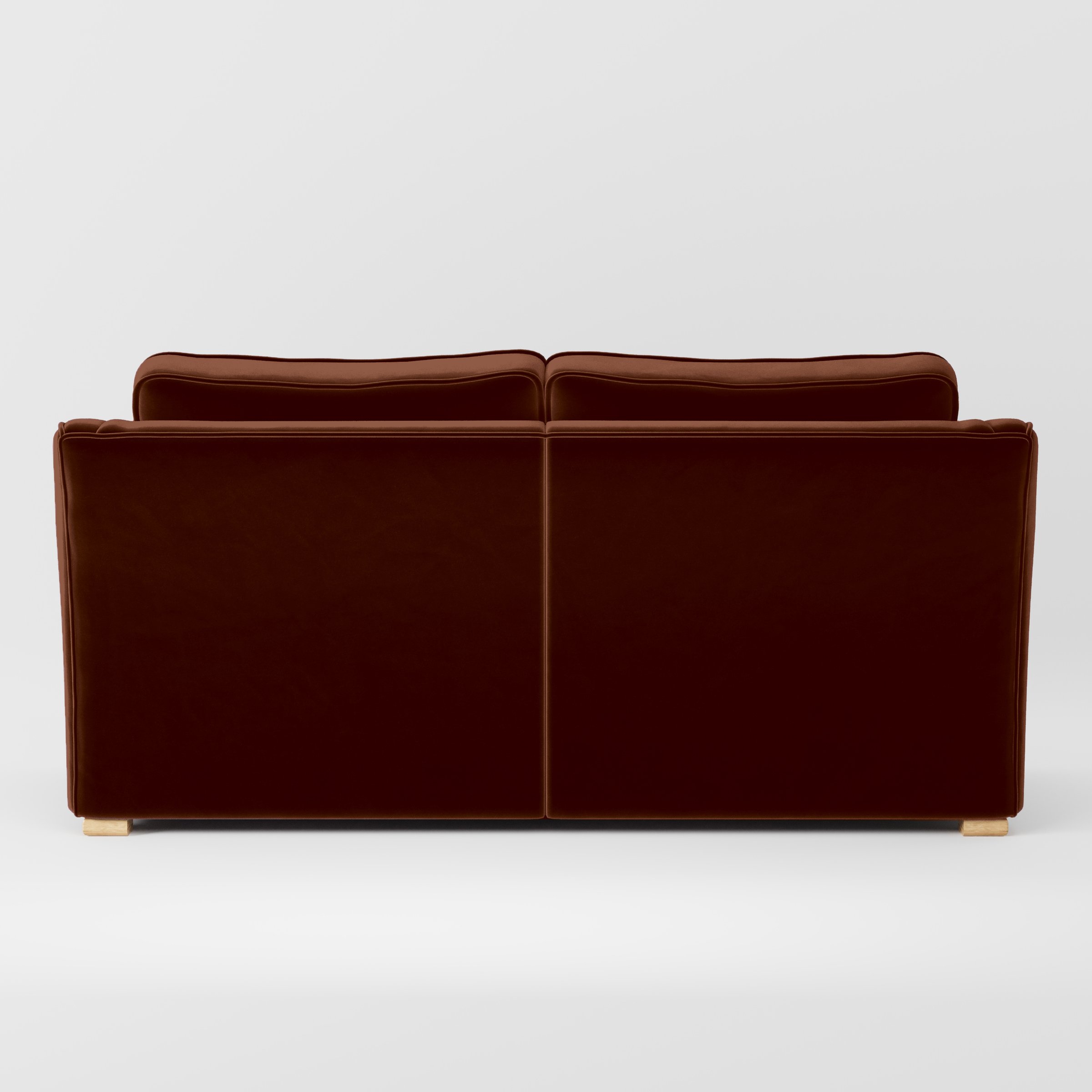 Rear view of the Cashel sofa upholstered in Plush EasyClean Velvet in Maple.