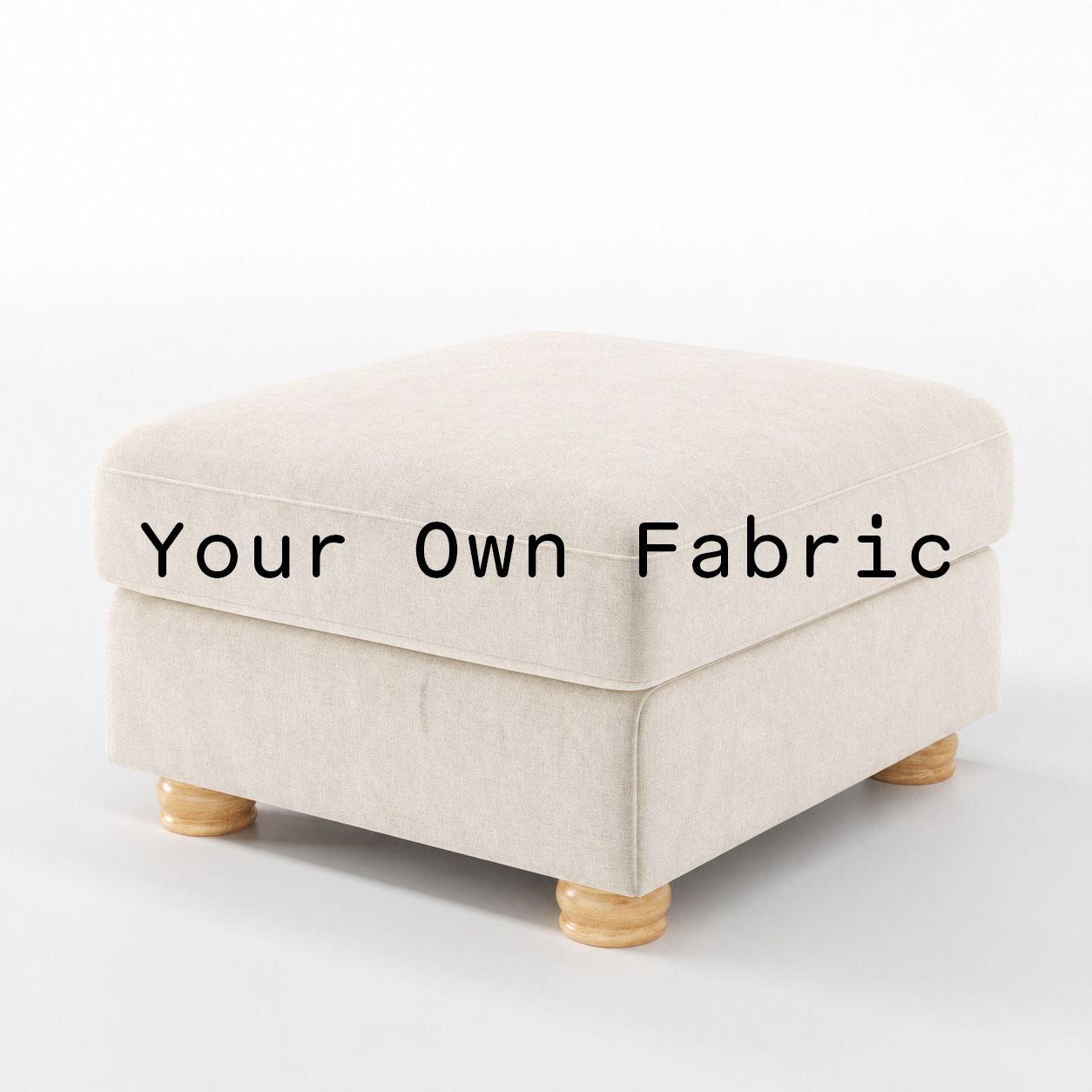 Diagonal view of the Anna Lee footstool upholstered in customers own material calico cotton fabric.