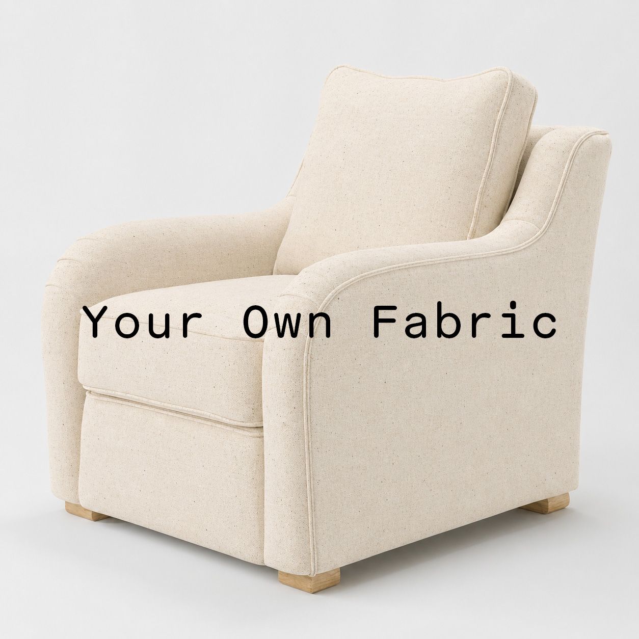 Diagonal view of the Cashel armchair upholstered in customers own material calico cotton fabric.