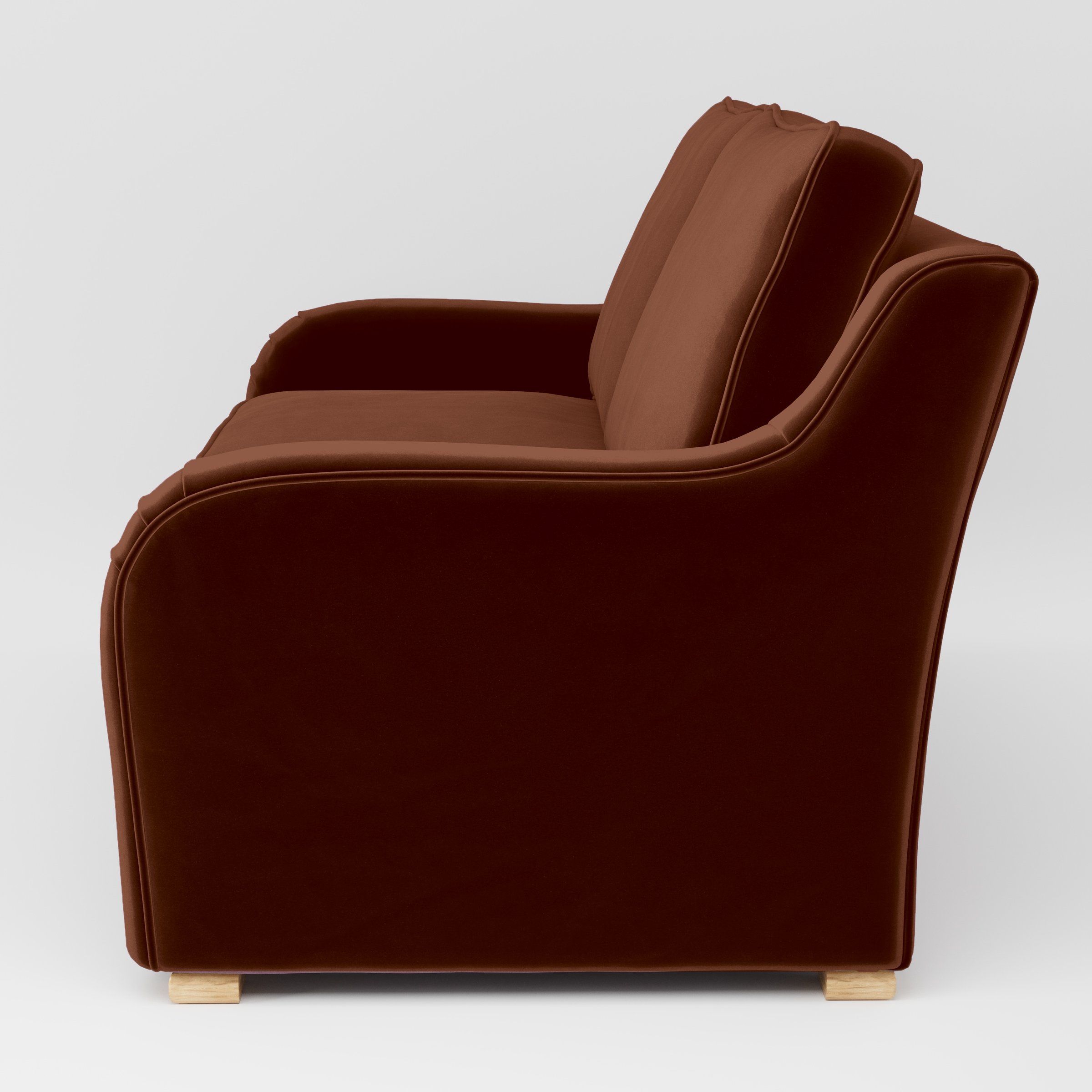 Side view of the Cashel sofa upholstered in Plush EasyClean Velvet in Maple.