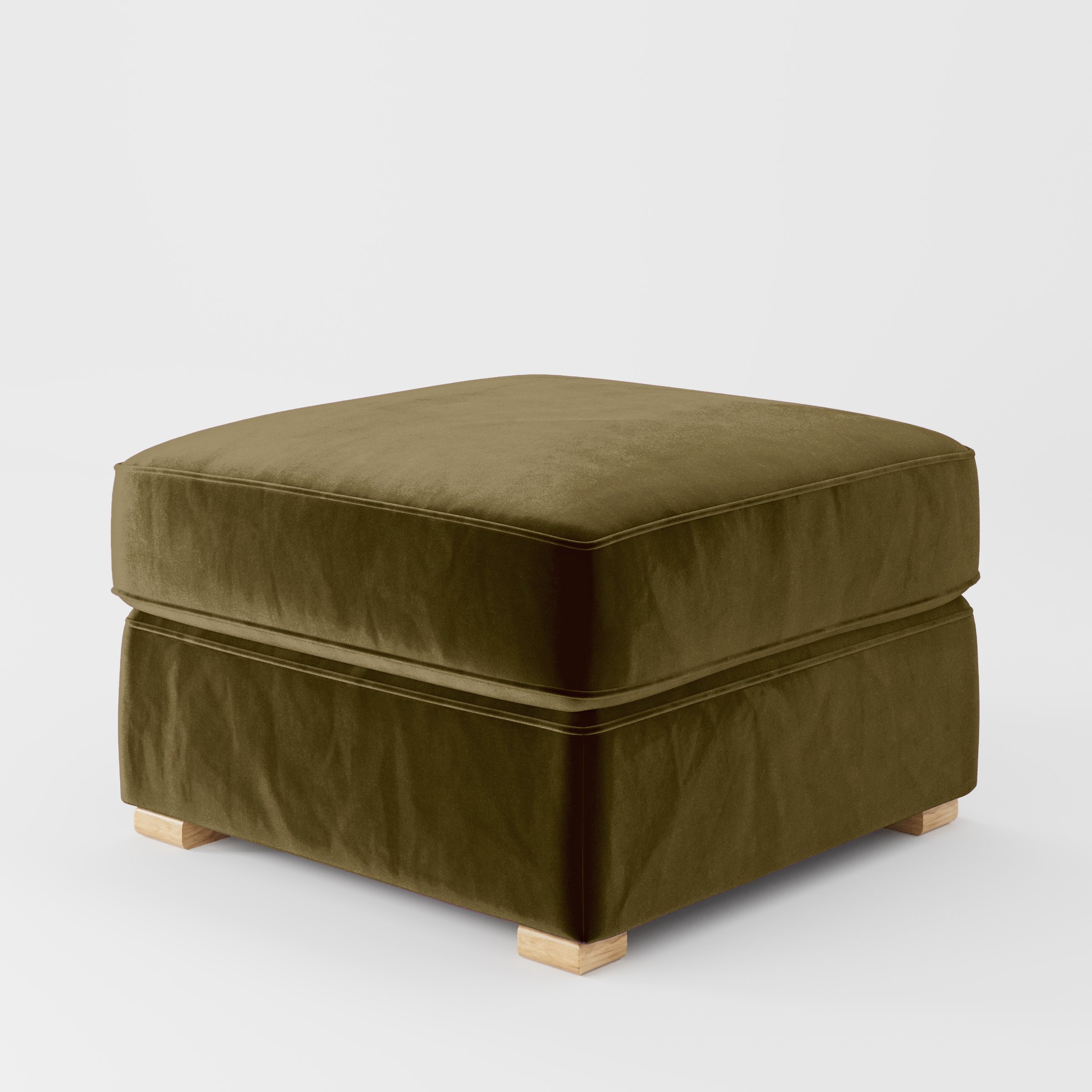 Diagonal view of the Cashel footstool upholstered in Plush EasyClean Velvet in Cedar.