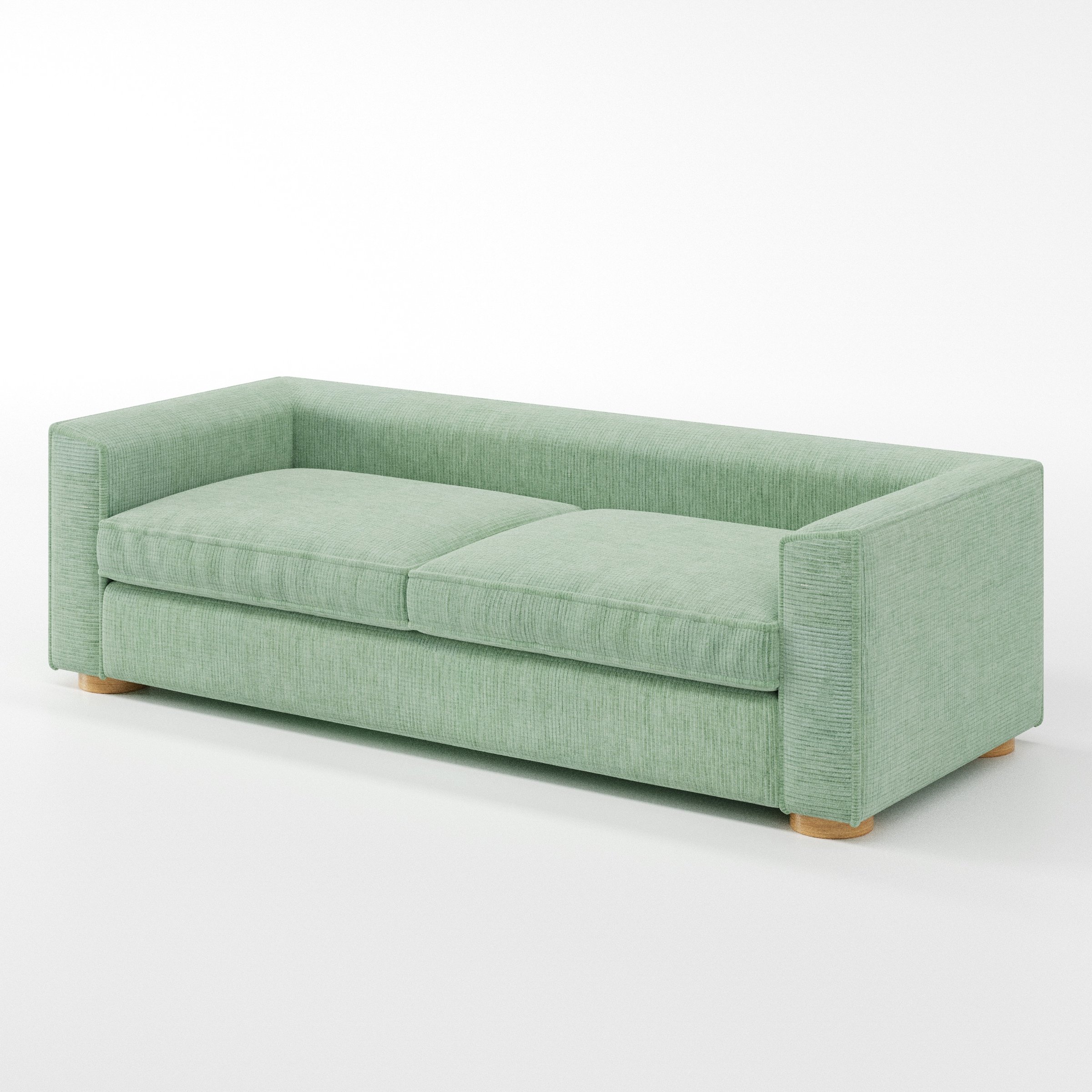 Feale sofa in Caldey Velvet Corduroy Eucalyptus shown at a diagonal angle highlighting arm profile and seat depth.