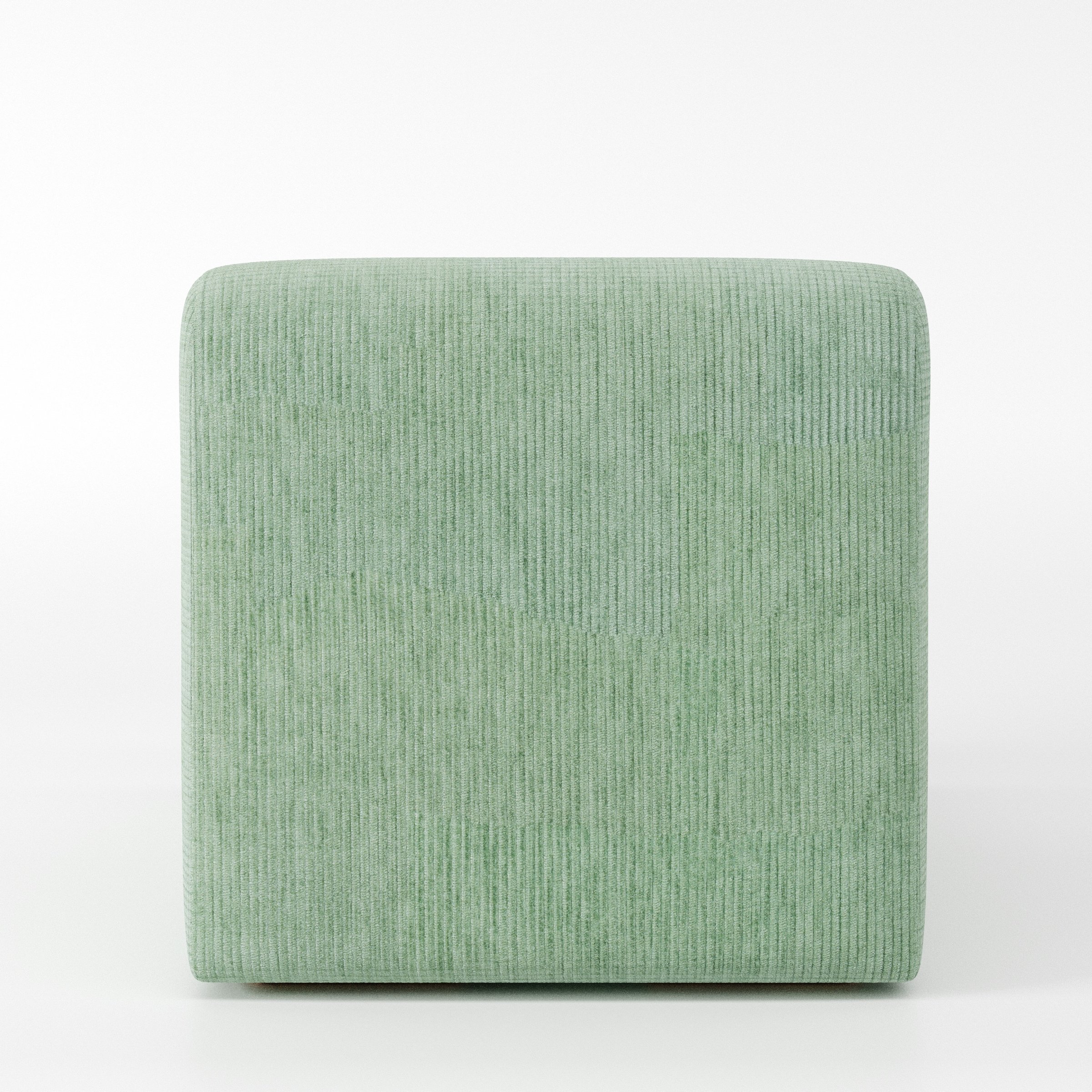 Drumquin modular sofa single unit in Caldey Velvet Corduroy Eucalyptus shown from the back with a smooth, softly curved silhouette.
