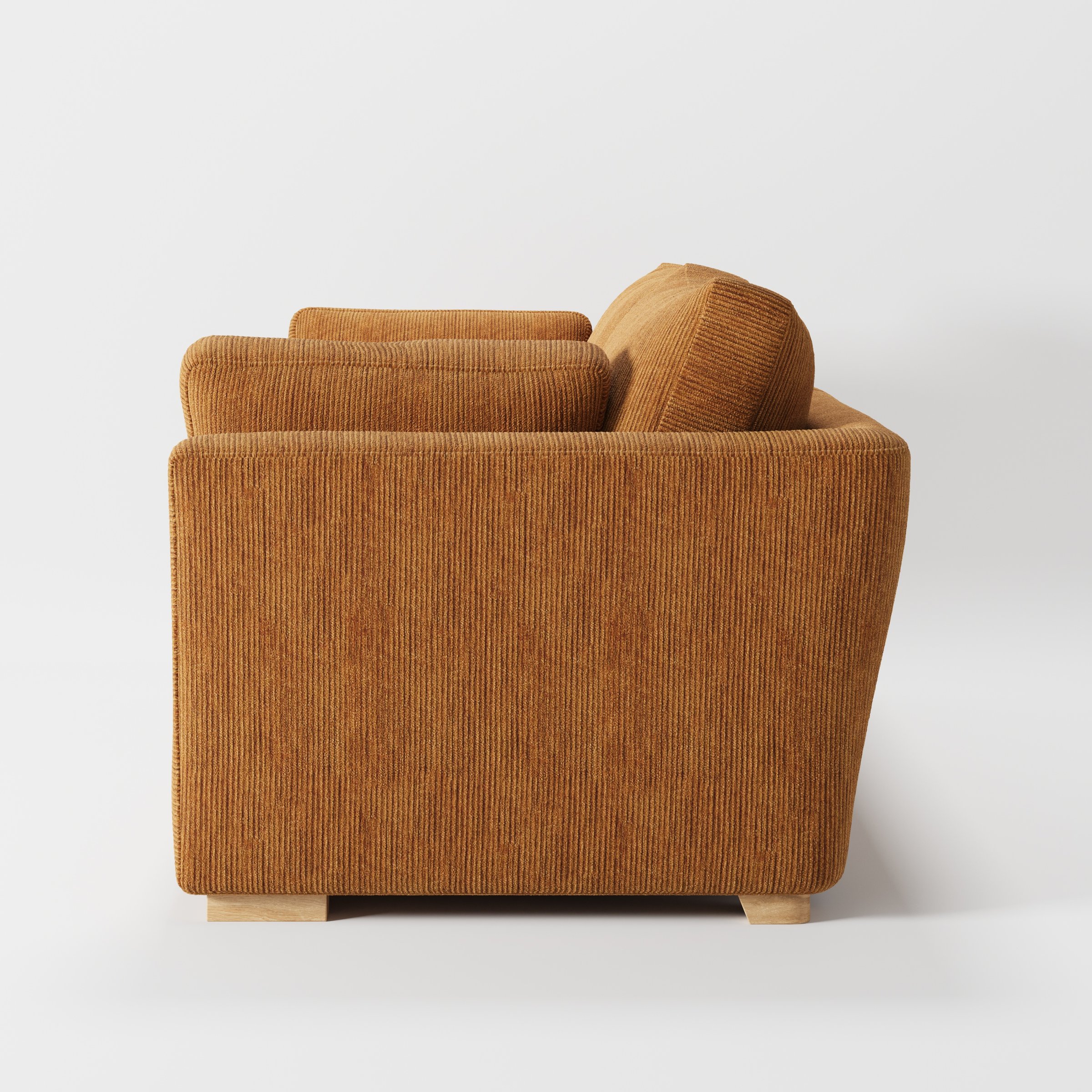 Stowe sofa in Caldey Velvet Corduroy Tobacco shown in side profile displaying proportions and overall silhouette.