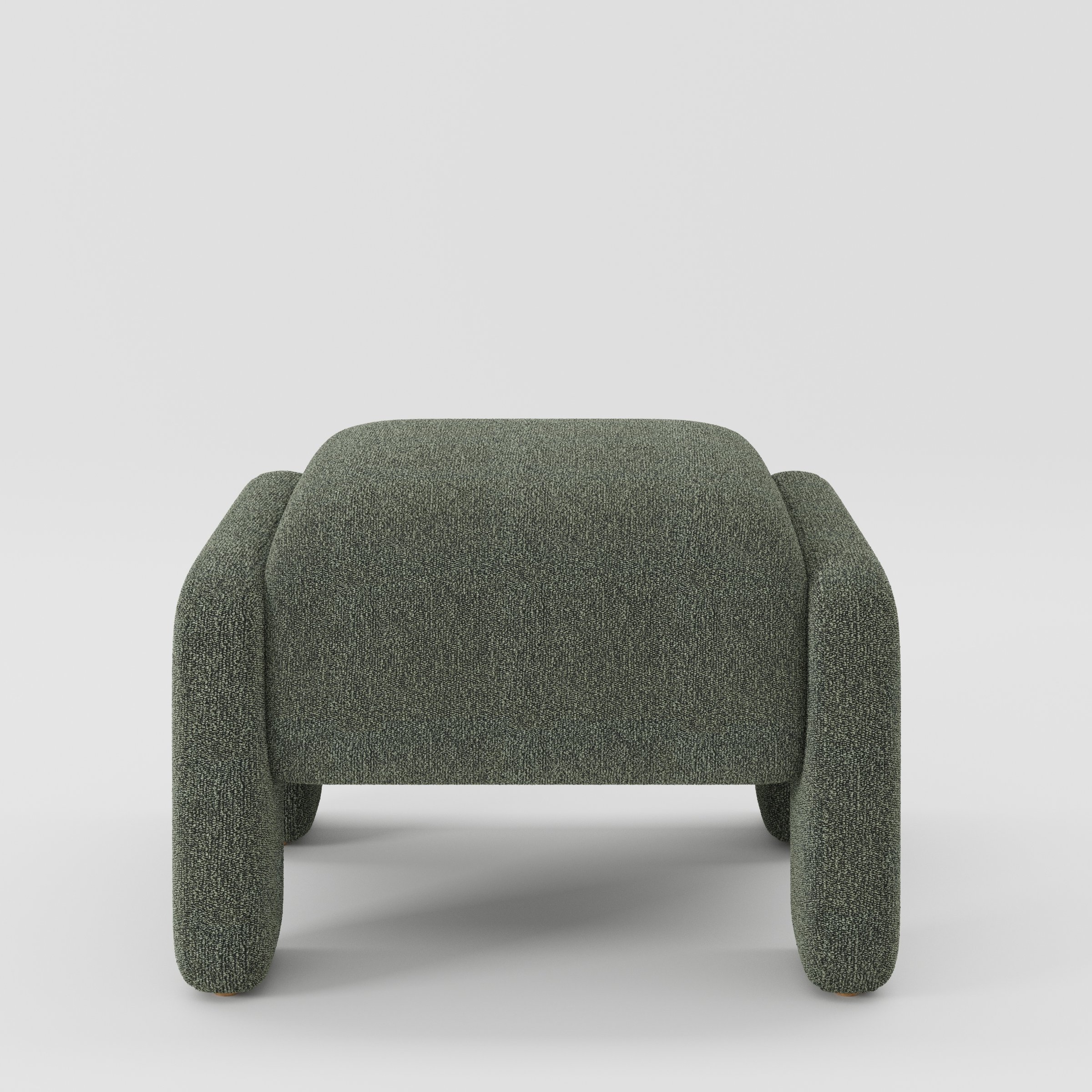 Inny footstool in Kilda bouclé moss fabric, front view showing rounded form and dense textured surface