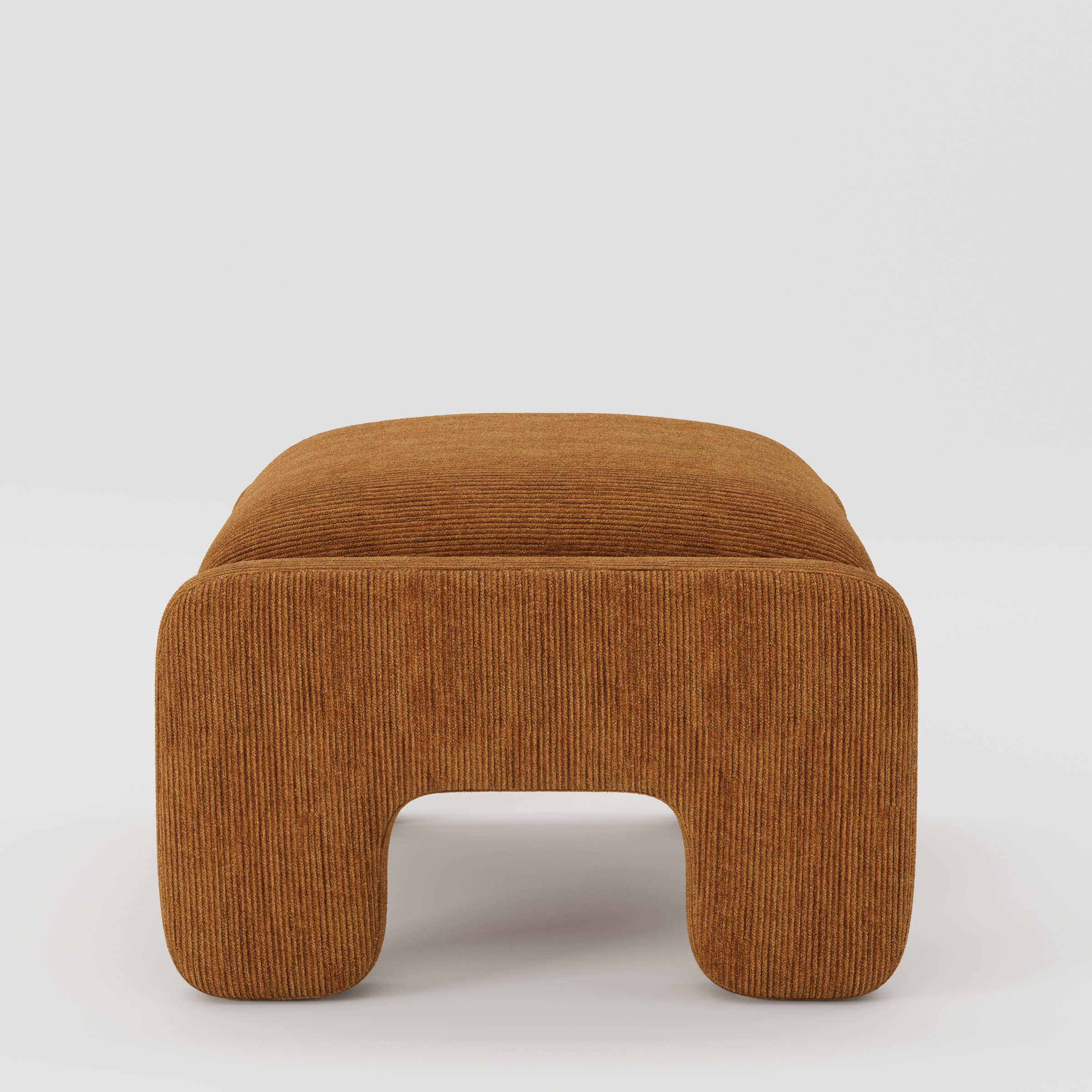 Inny footstool in Caldey velvet corduroy tobacco fabric, side view emphasising low profile and structured upholstered legs