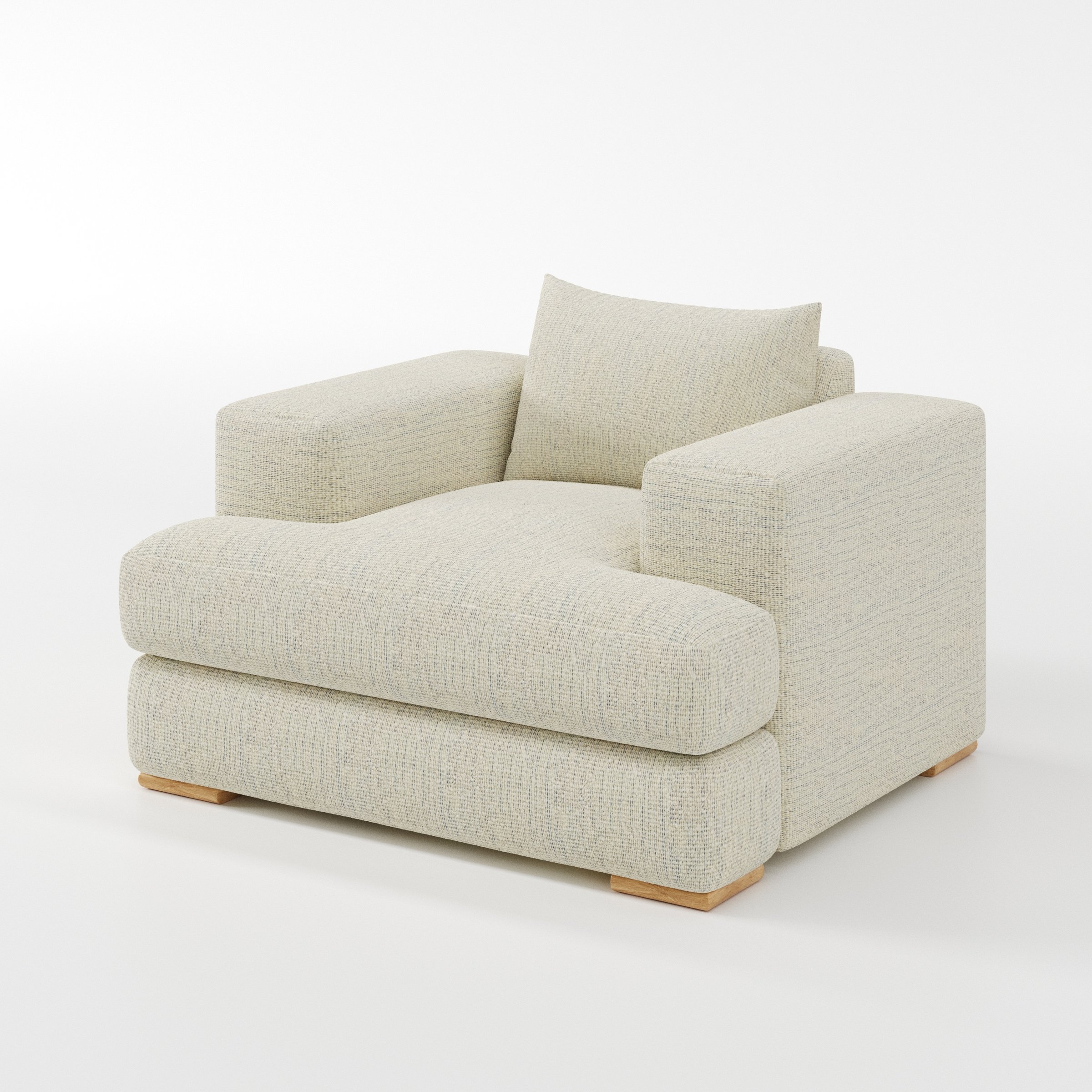 Fane armchair in Orsay Boucle Cream and Marine shown at a diagonal angle highlighting arms and seat depth.