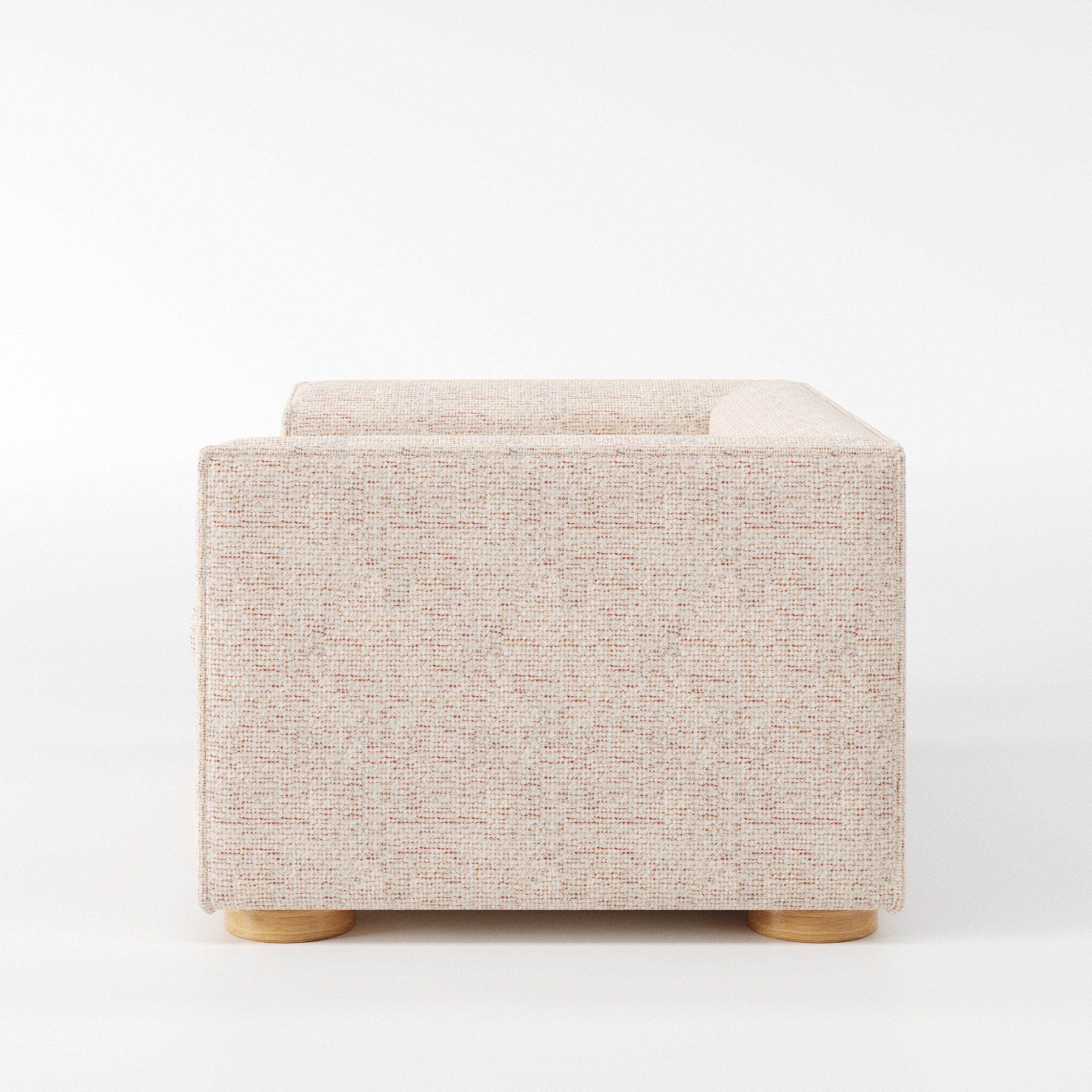 Feale armchair in Orsay Boucle Cream and Copper shown in side profile displaying proportions and overall silhouette.