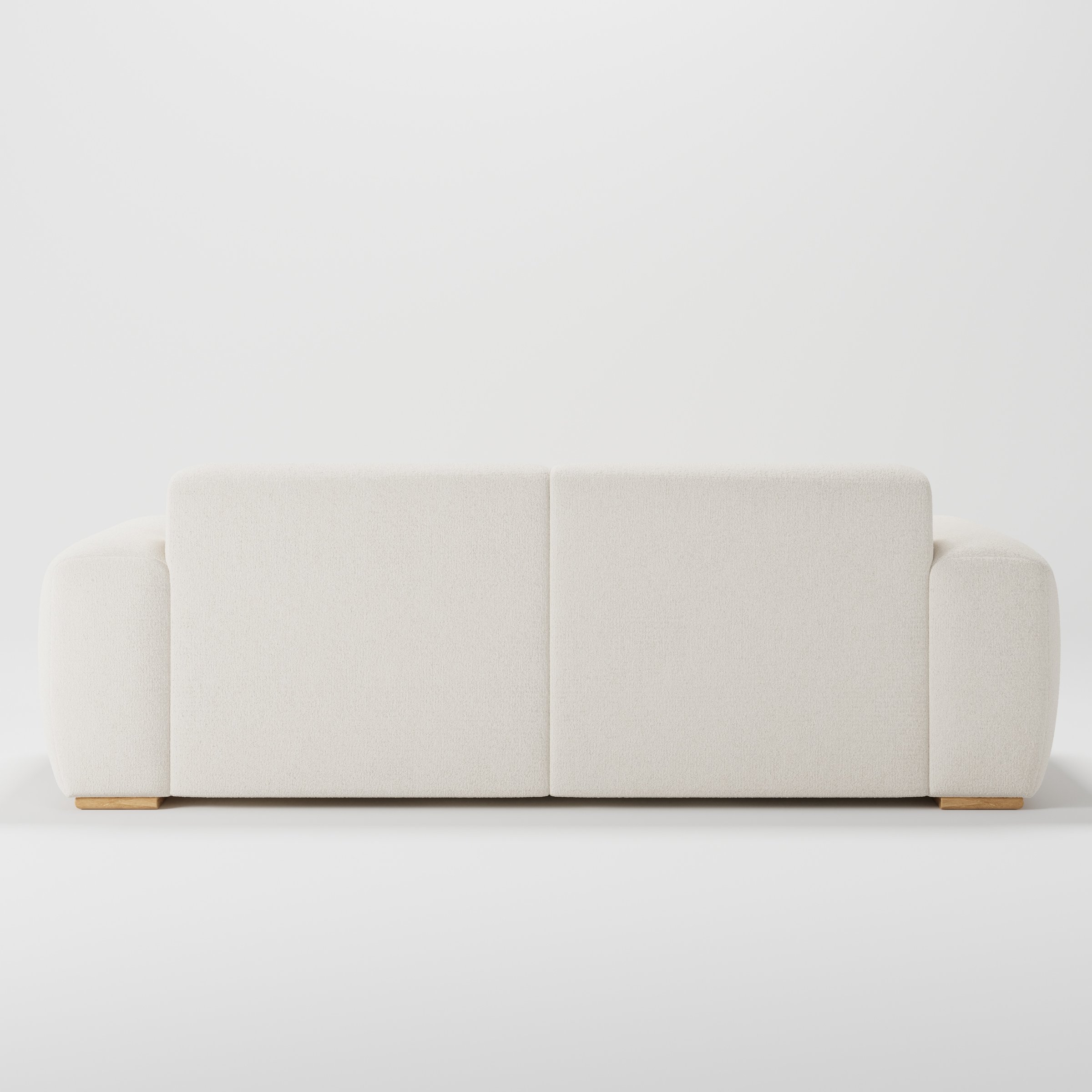 Darwell sofa in Kilda Boucle Cream shown from the rear highlighting back cushions and upholstery finish.