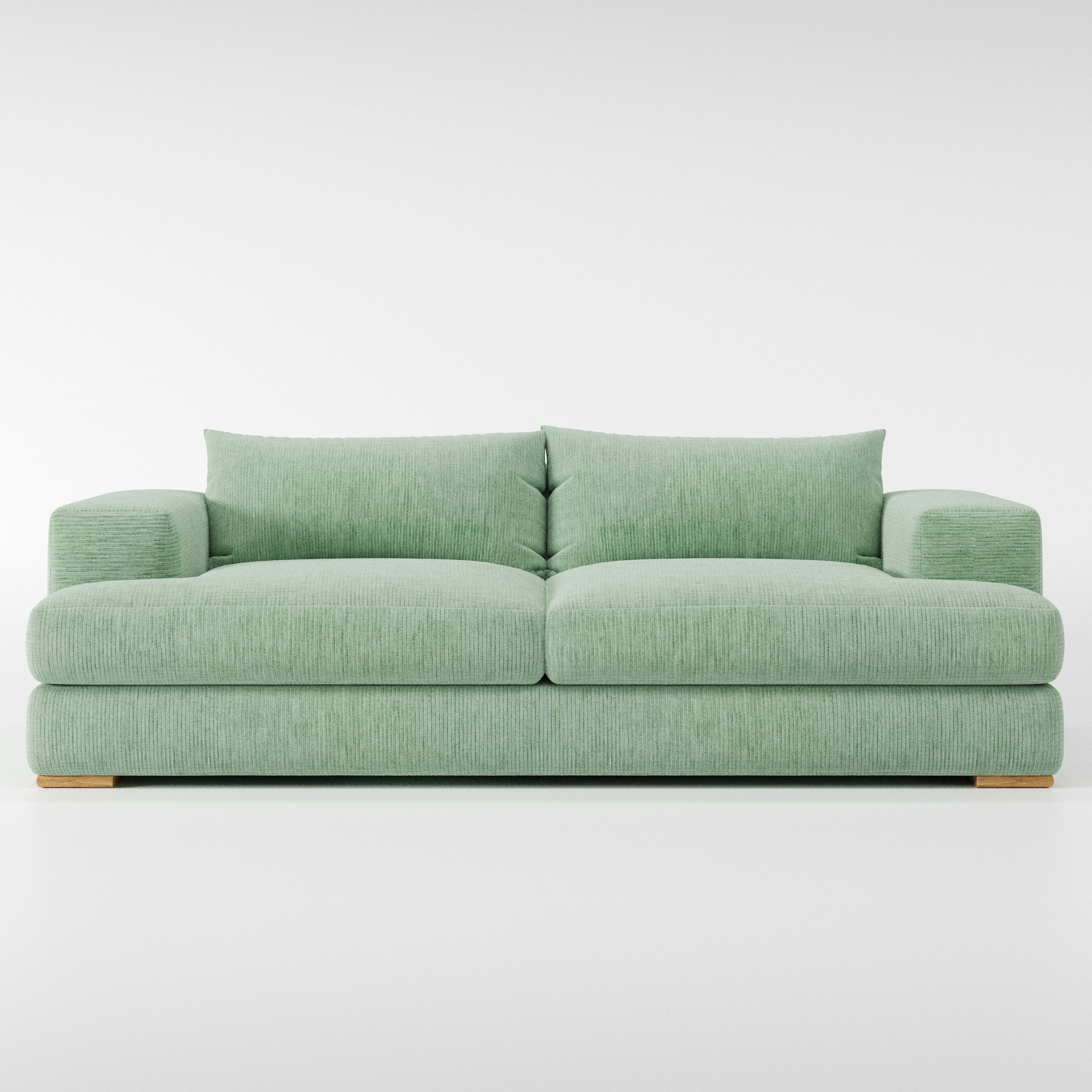 Fane sofa in Caldey Velvet Corduroy Eucalyptus shown front-on against a neutral studio backdrop.