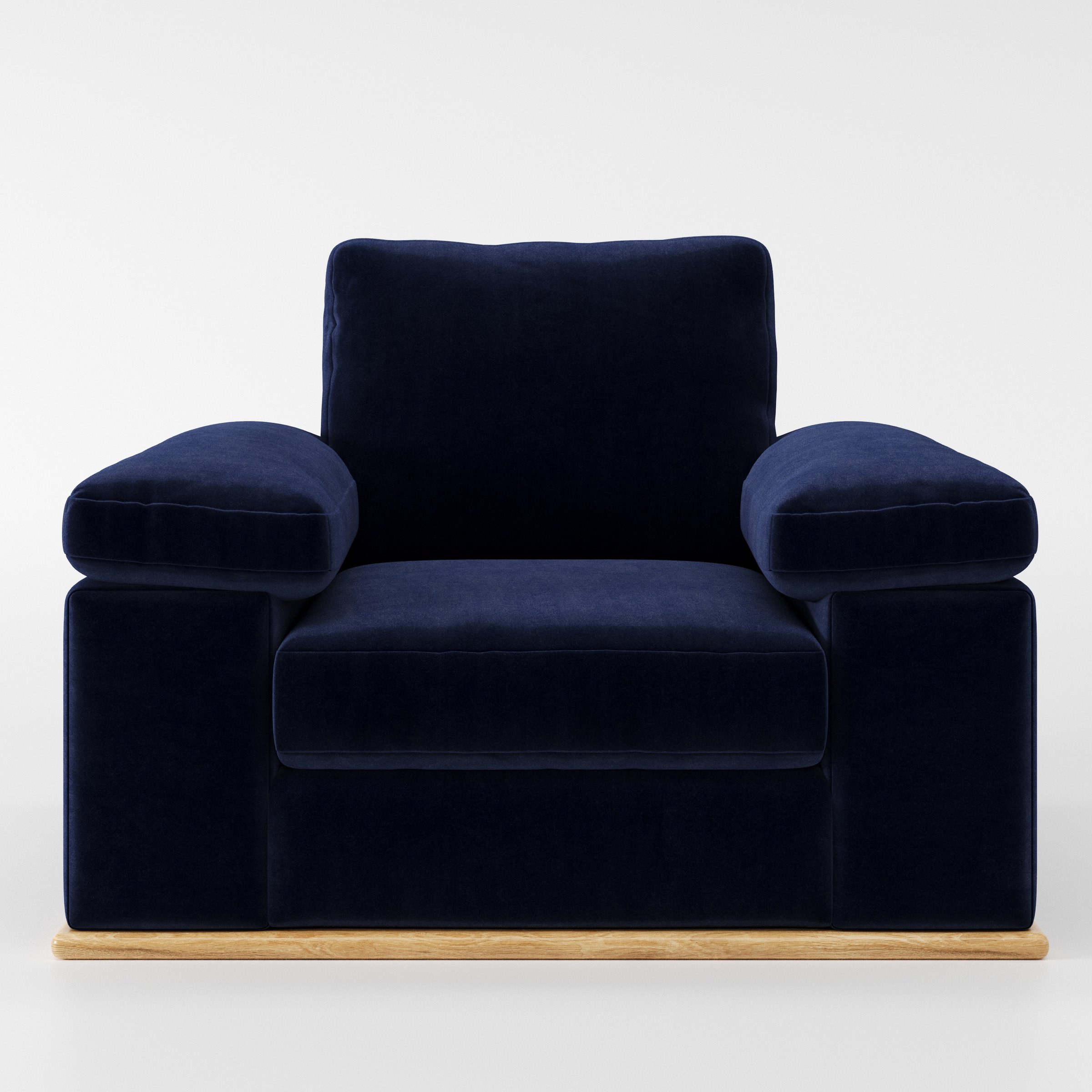 Cusher armchair in Noss Velvet Navy shown front-on against a neutral studio backdrop.