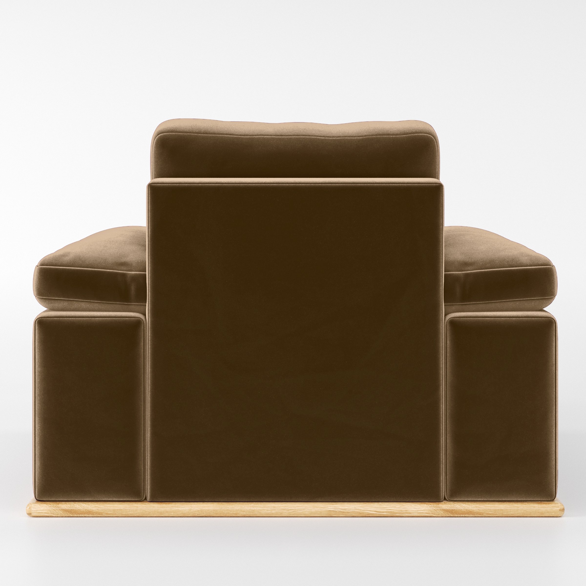 Rear view of the Cusher armchair upholstered in Plush EasyClean Velvet in Caribou.