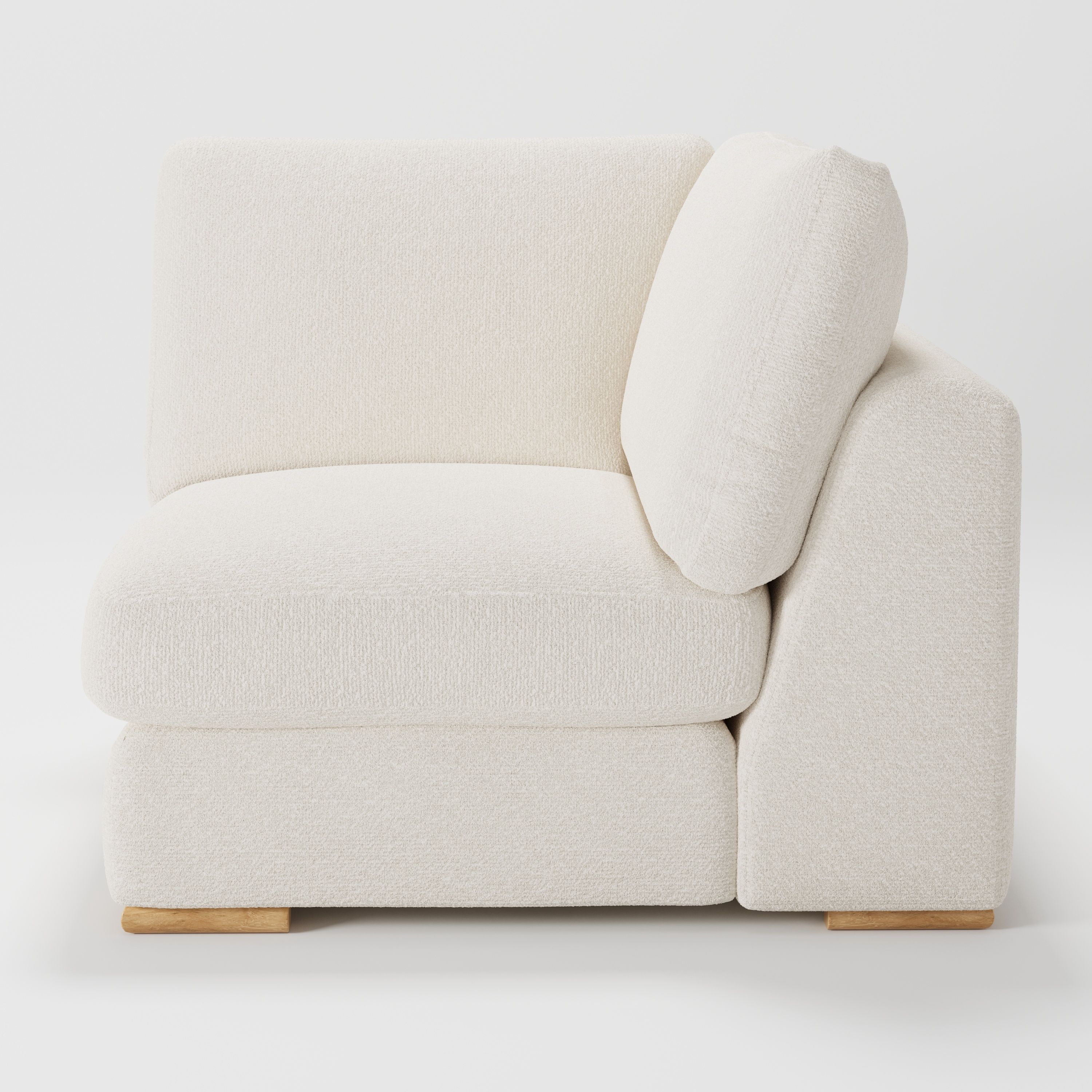 Olton corner unit in Kilda bouclé cream fabric, right side view emphasising seat depth and soft form