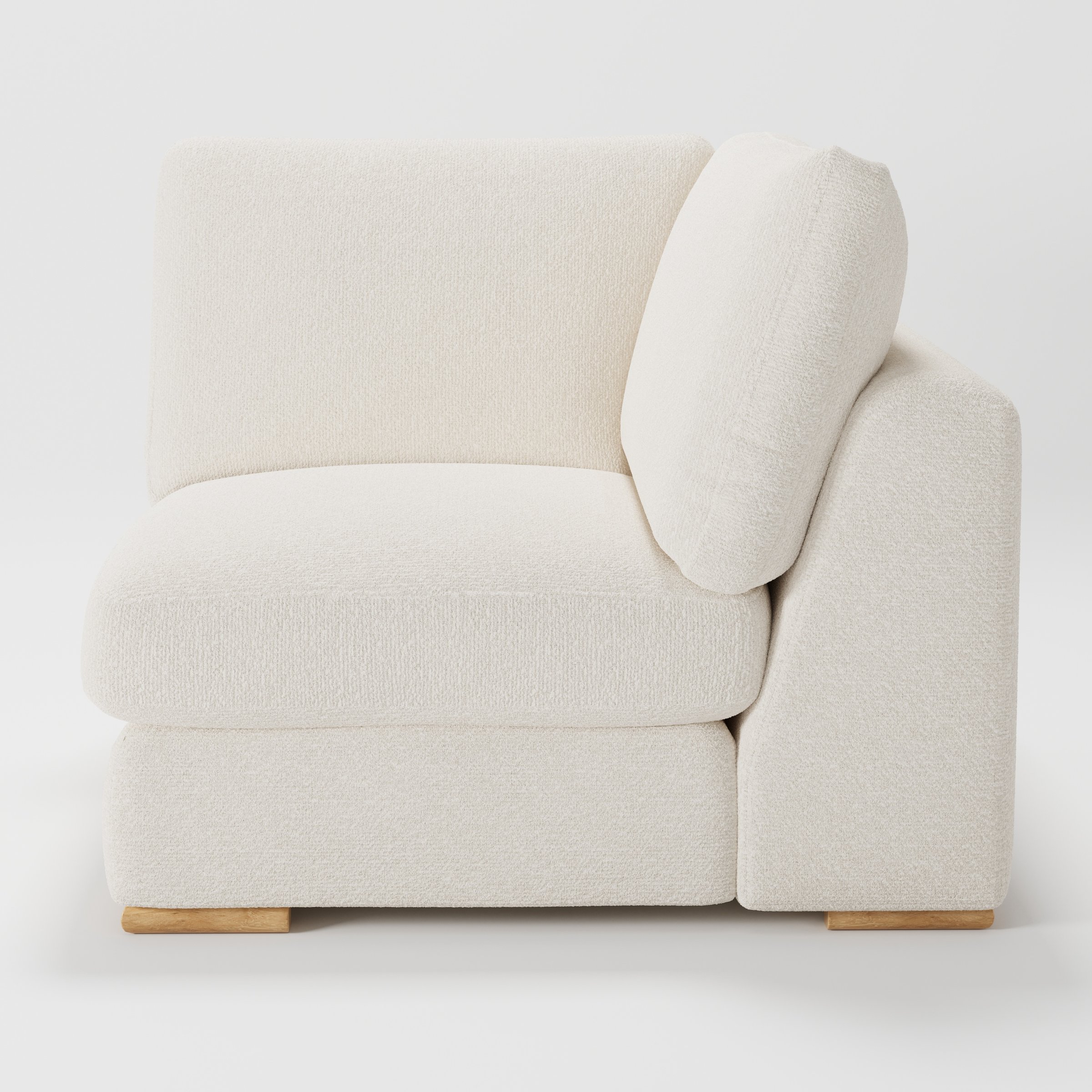 Olton corner unit in Kilda bouclé cream fabric, right side view emphasising seat depth and soft form