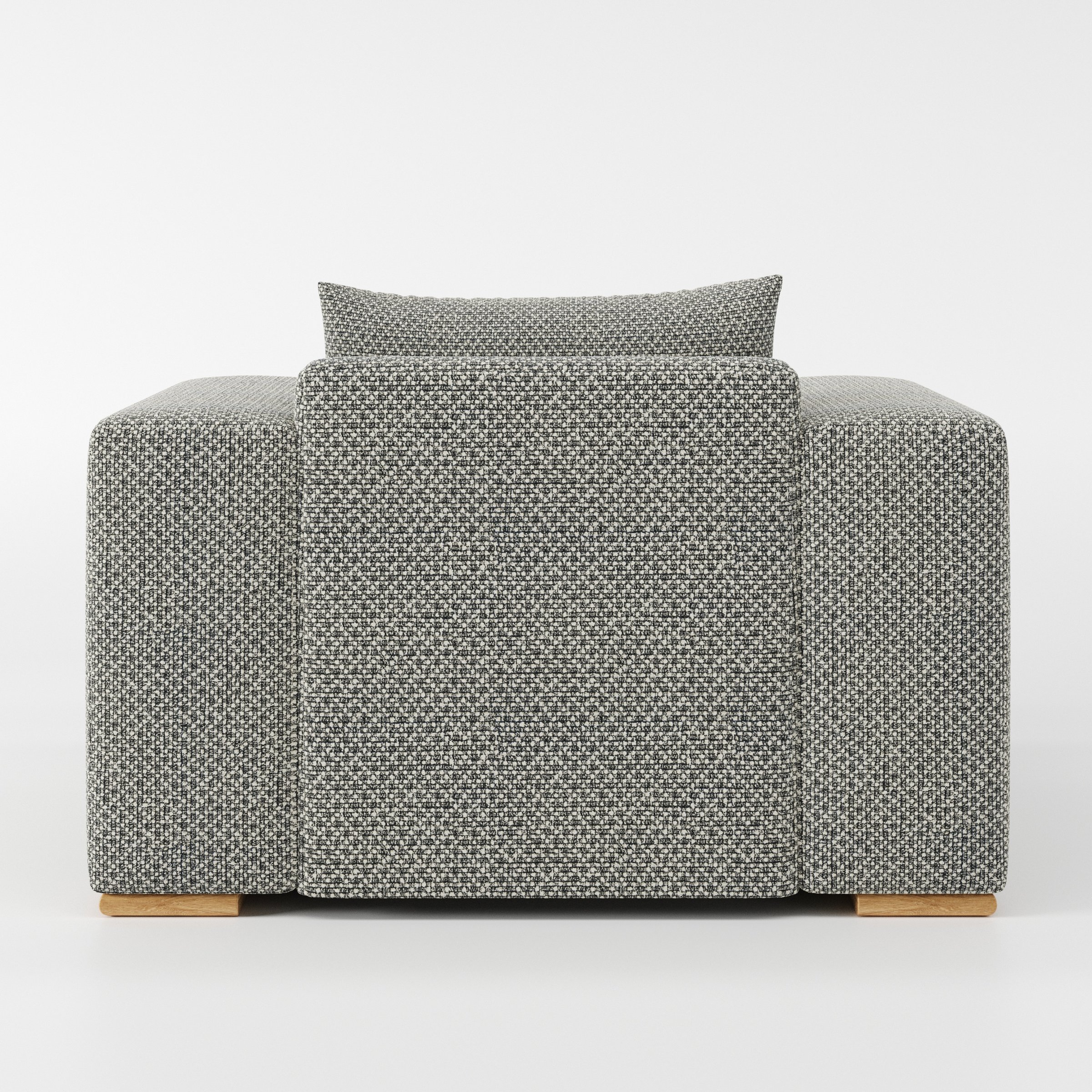 Fane armchair in Rousay Wool Blend Tar and Chalk shown from the rear highlighting backrest shape and upholstery finish.