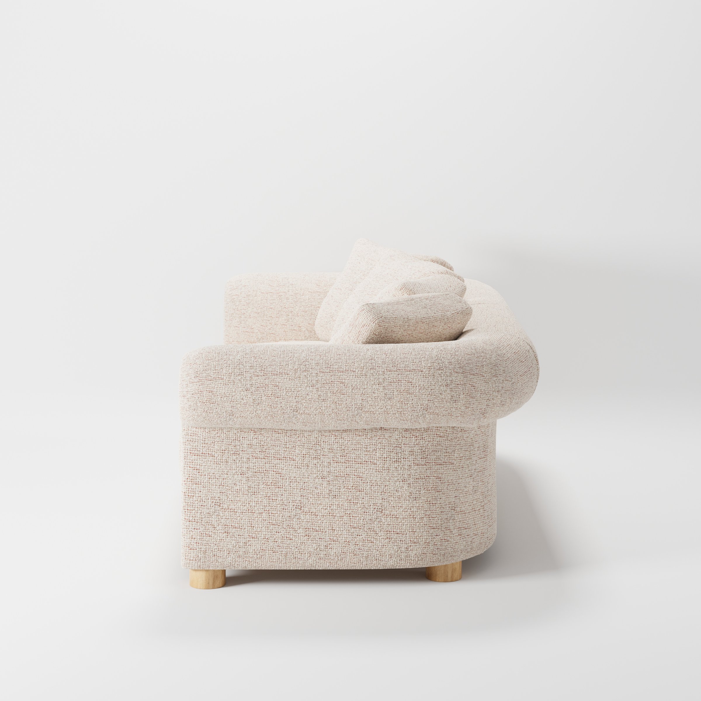 Windermere sofa in Orsay Boucle Cream and Copper shown in side profile displaying proportions and overall silhouette.