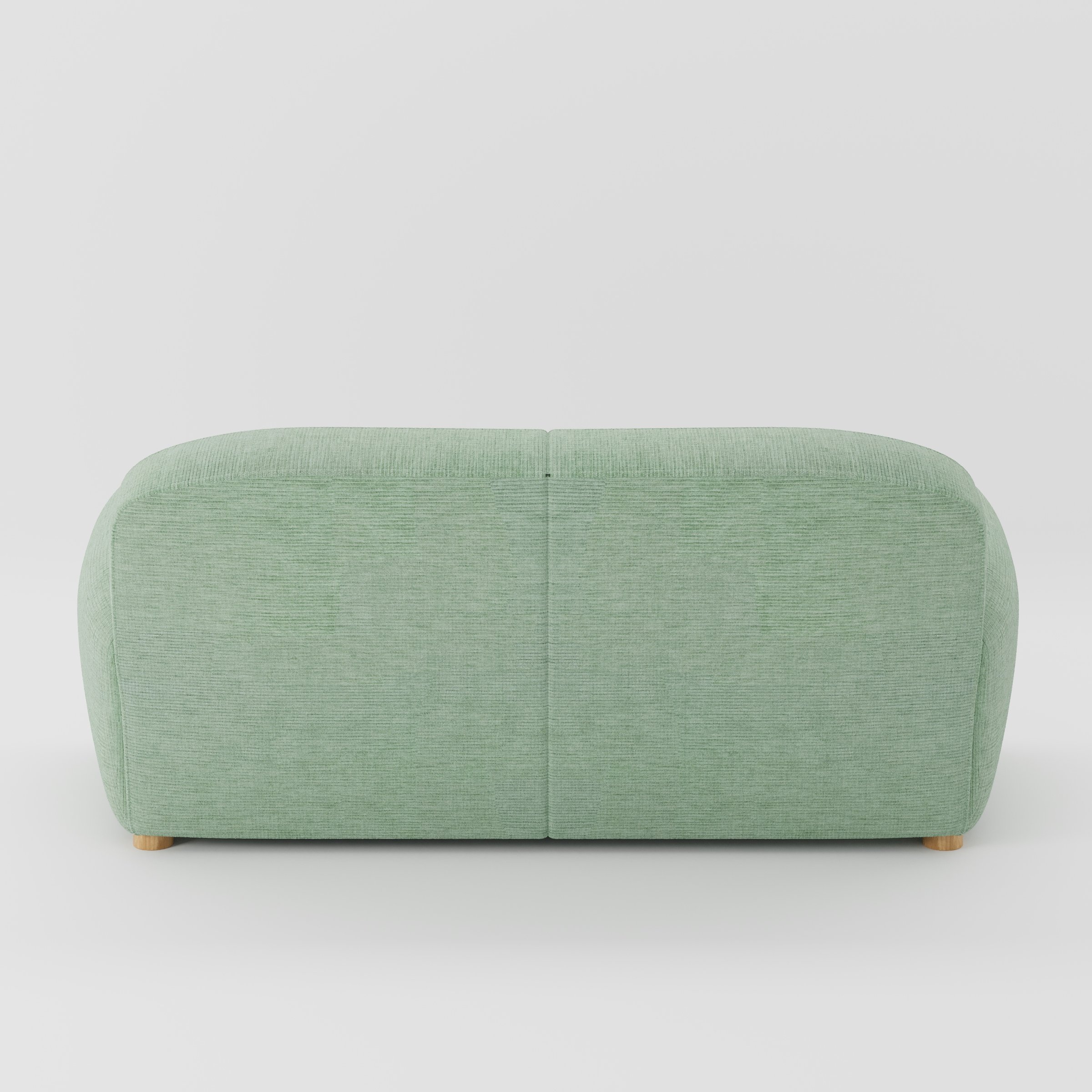 Fergus sofa in Caldey Velvet Corduroy Eucalyptus shown from the rear highlighting back cushions and upholstery finish.