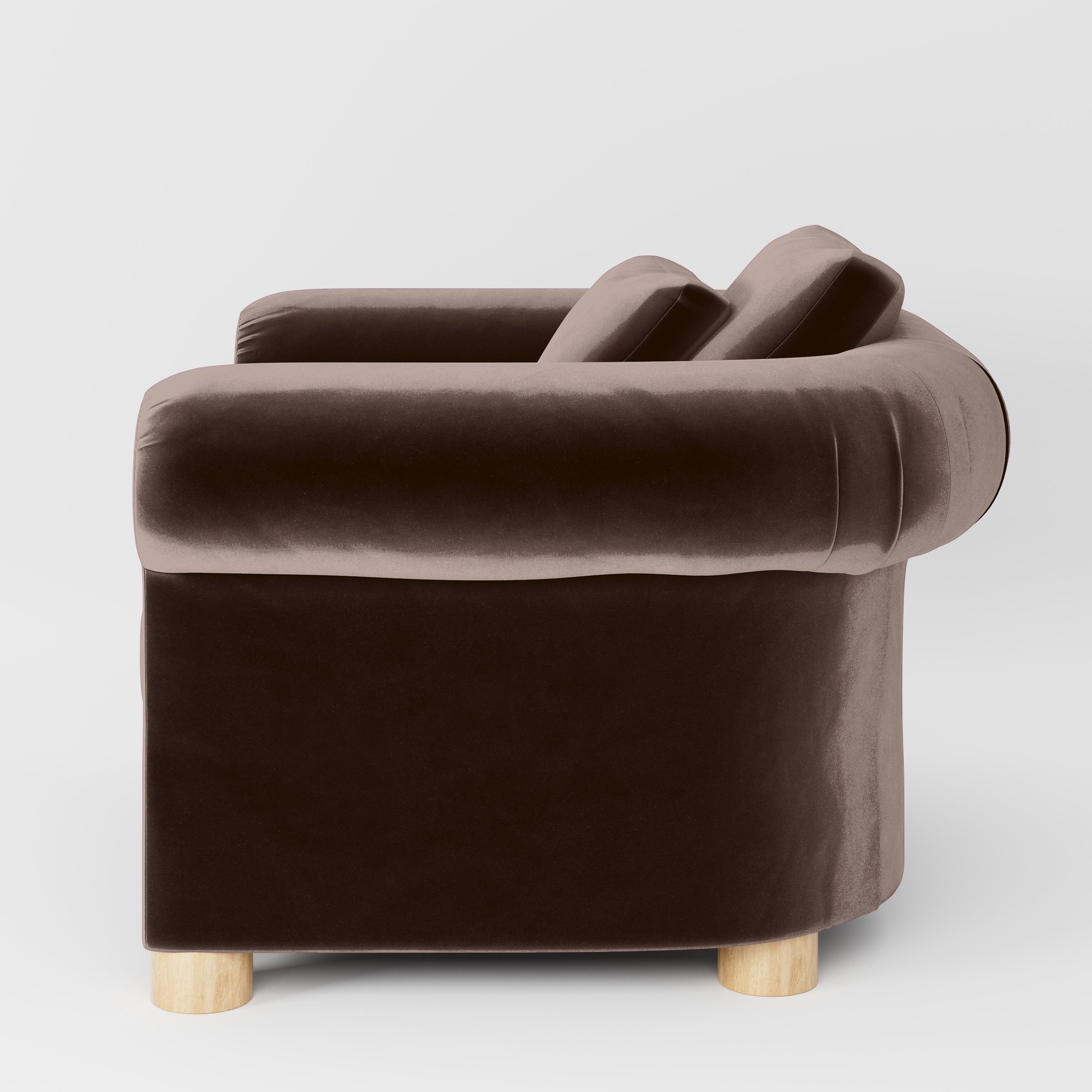 Side view of the Windermere armchair upholstered in Plush EasyClean Velvet in Mole.