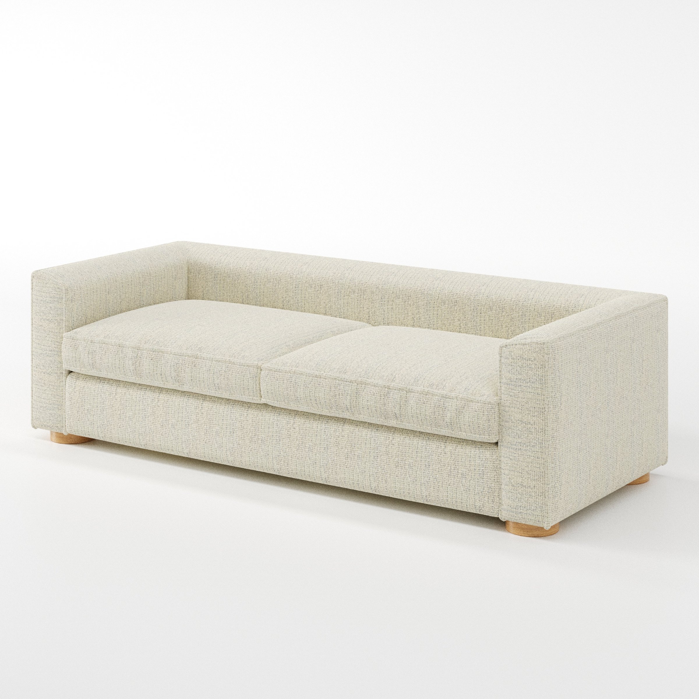 Feale sofa in Orsay Boucle Cream and Marine shown at a diagonal angle highlighting arm profile and seat depth.