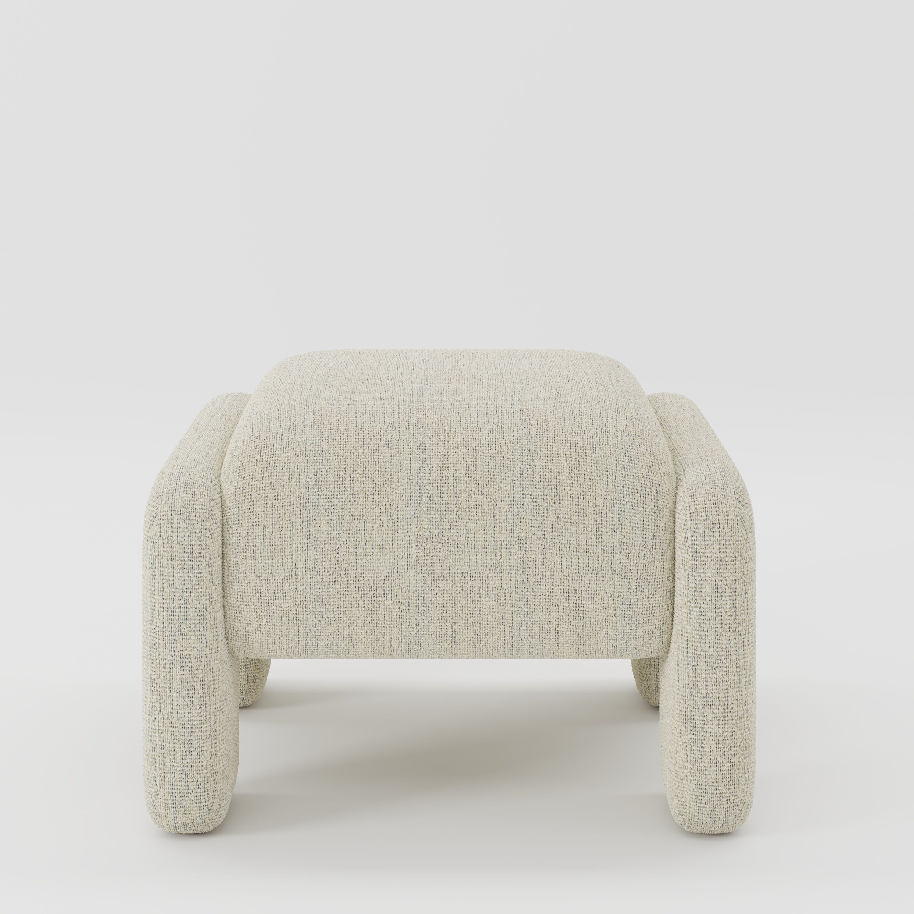 Inny footstool in Orsay bouclé cream and marine fabric, front view showing soft form and contrasting woven texture