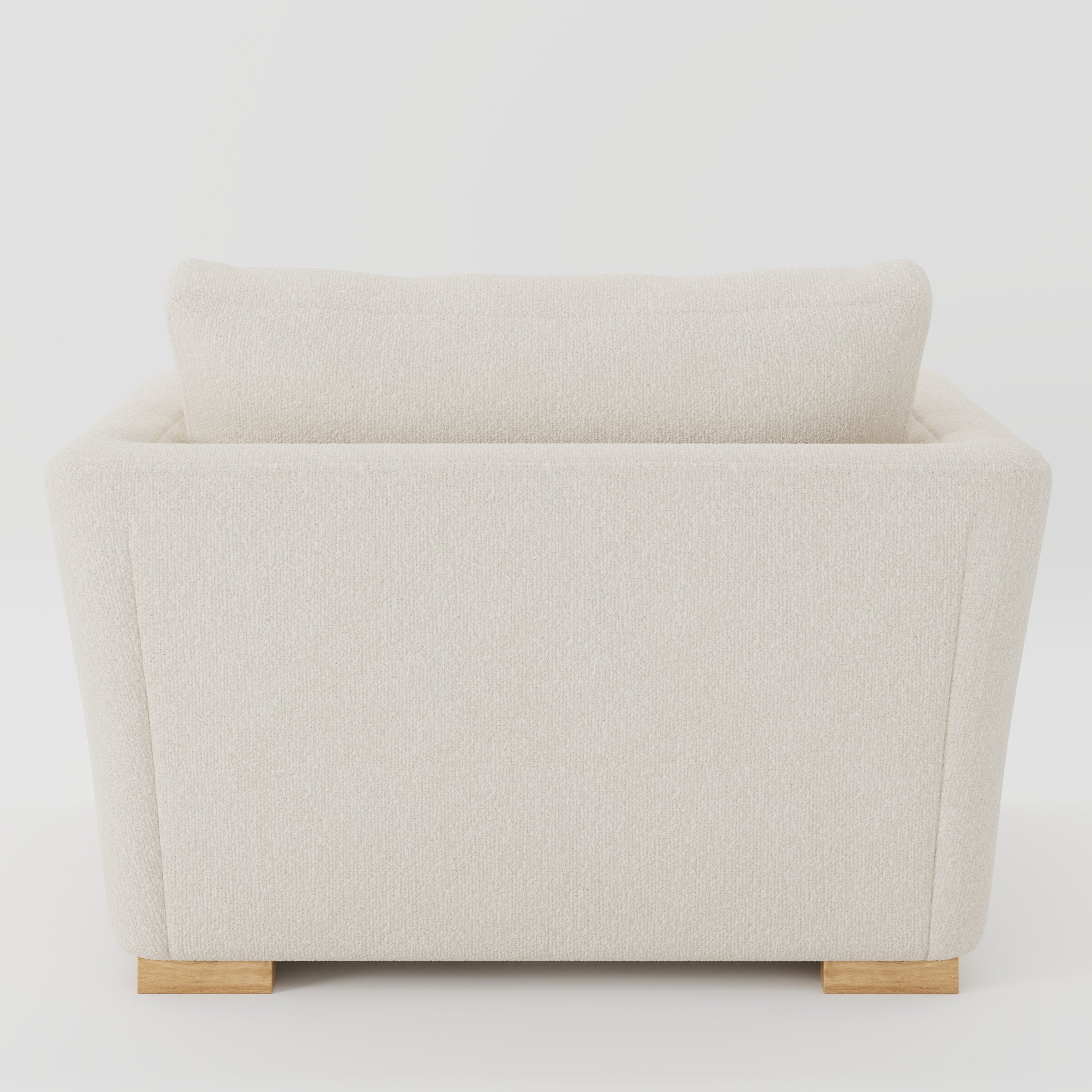 Stowe armchair in Kilda Boucle Cream shown from the rear highlighting backrest shape and upholstery finish.