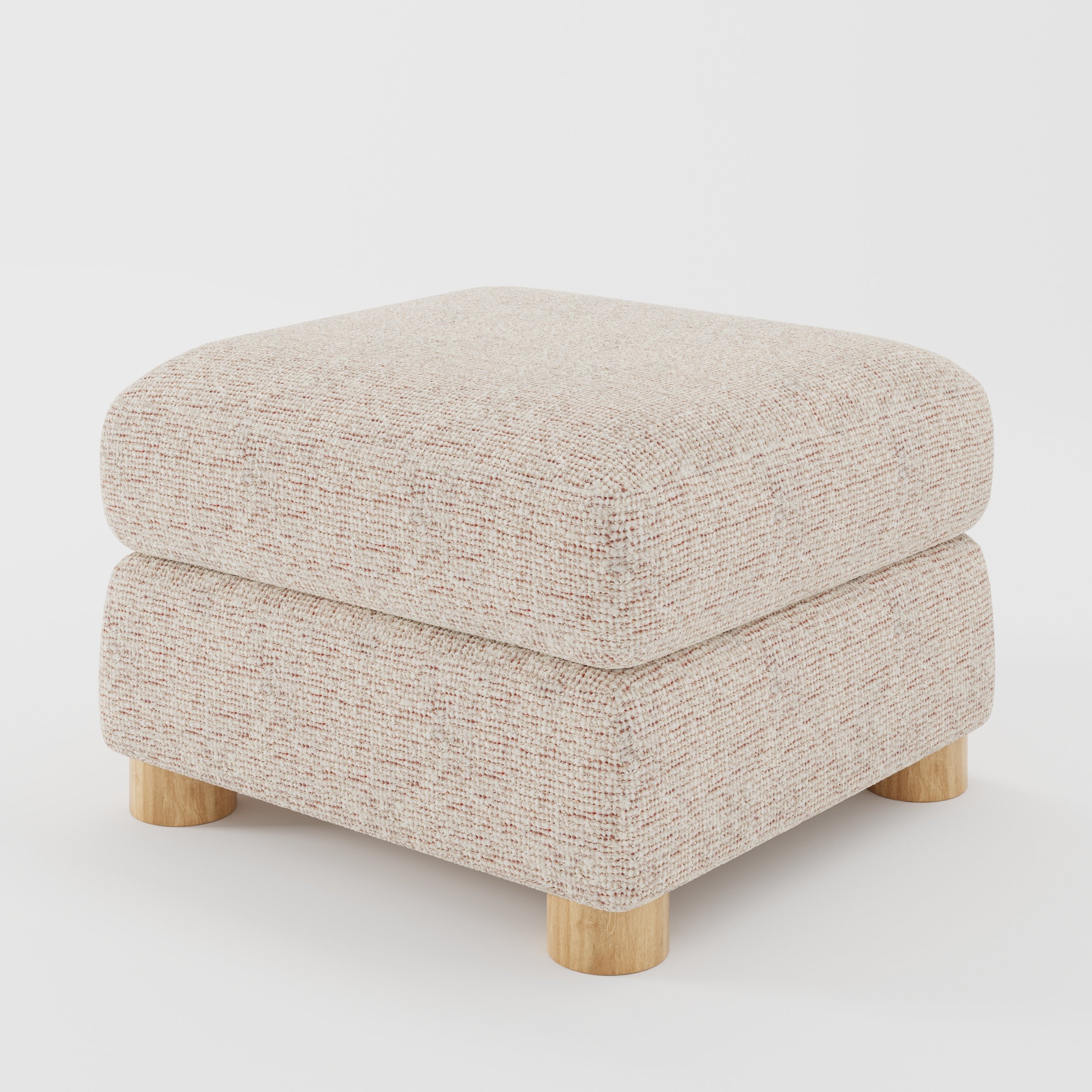 Windermere footstool in Orsay Boucle Cream and Copper shown at a diagonal angle highlighting soft corners and rounded wooden feet.